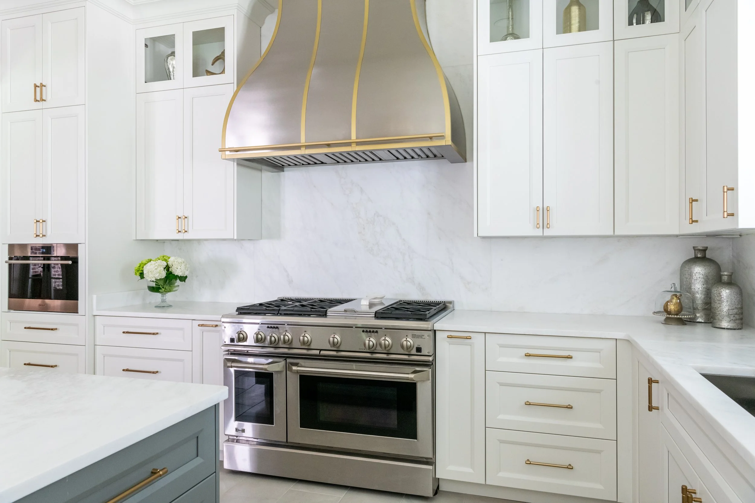 The new kitchen hood, range and cabinets.
