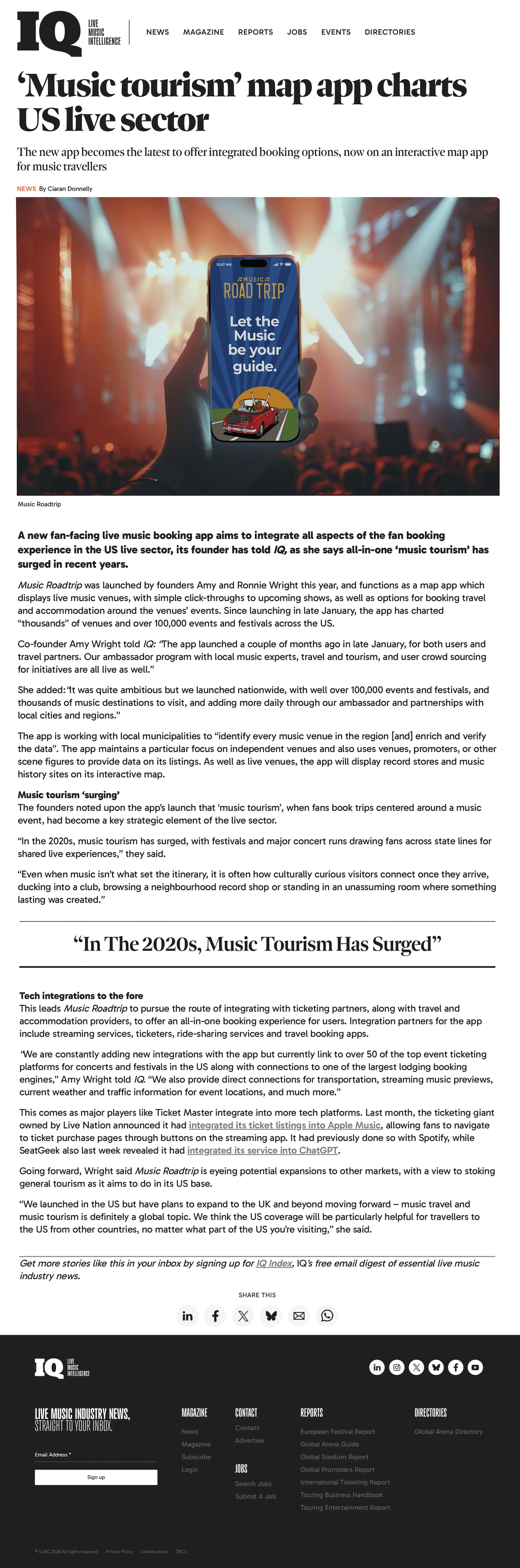 A news article about a new music tourism map app, showing a person holding a smartphone displaying an app called 'Music Road Trip' in front of a concert stage with bright lights.