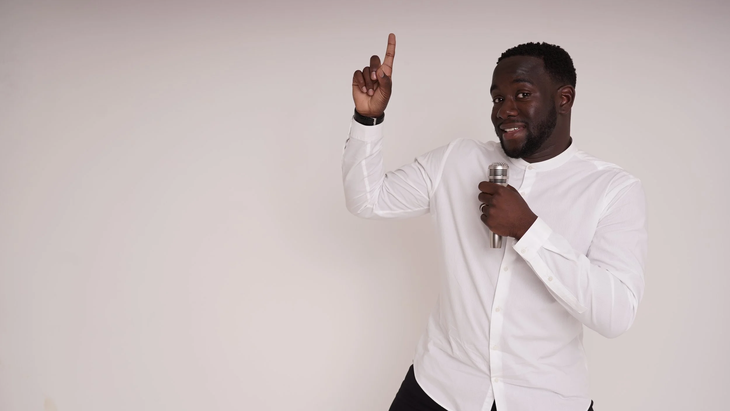 Joseph pointing to the booking form