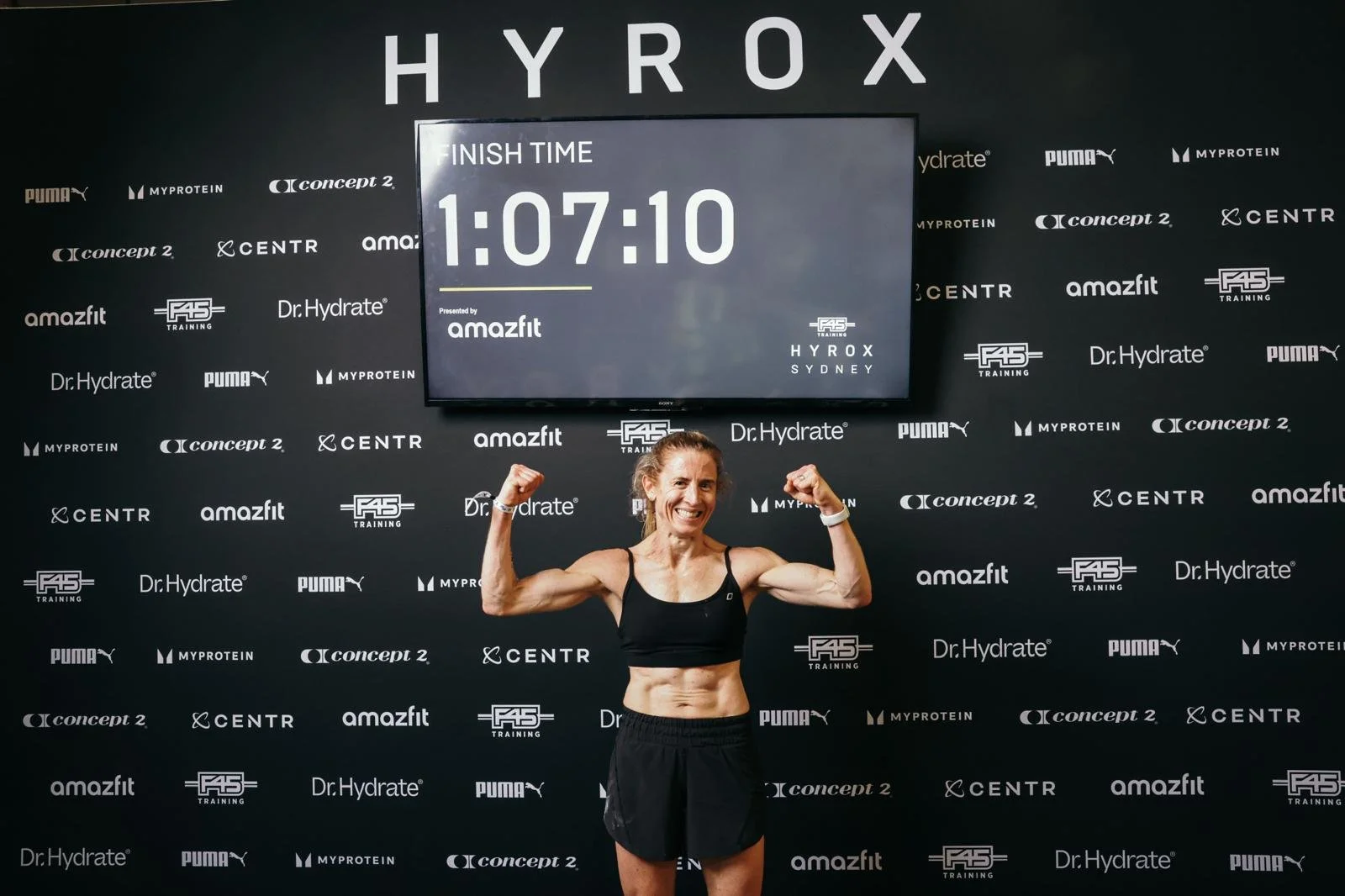 Katie Kemp competing at HYROX Sydney after training with Urban Fitness Wellington