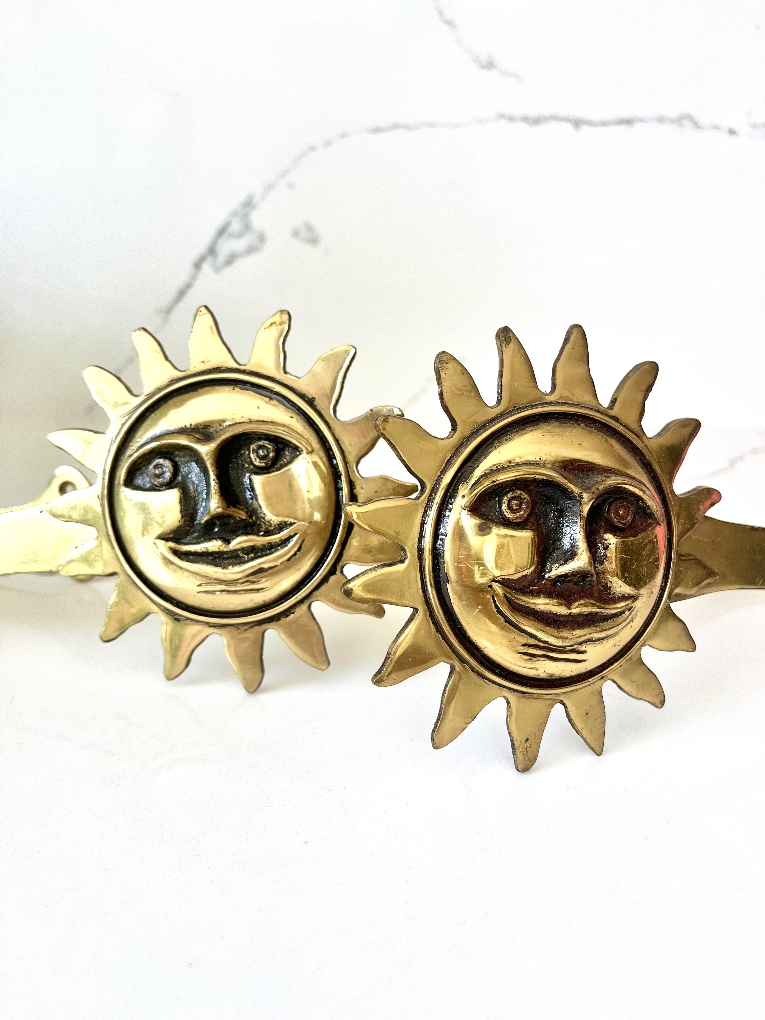 Pair of brass sun face curtain tie backs 6.jpeg