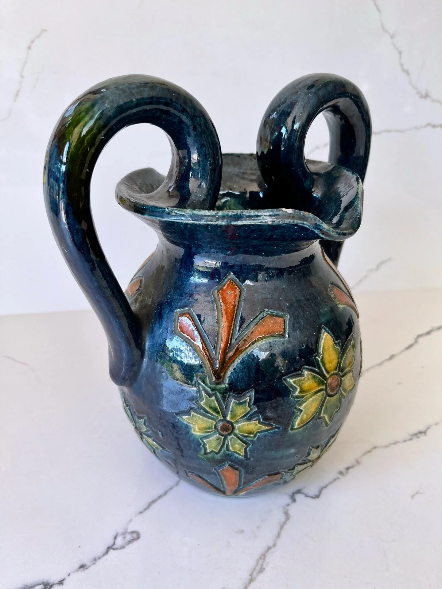 Dark Blue Stoneware Flemish/Swedish Etched &amp; Hand Painted Vase With Handles
This arts and crafts vase is thought to date from the early Art Deco period. With its art nouveau style design in dark earthy jewelled colours of blue, terracotta and yel