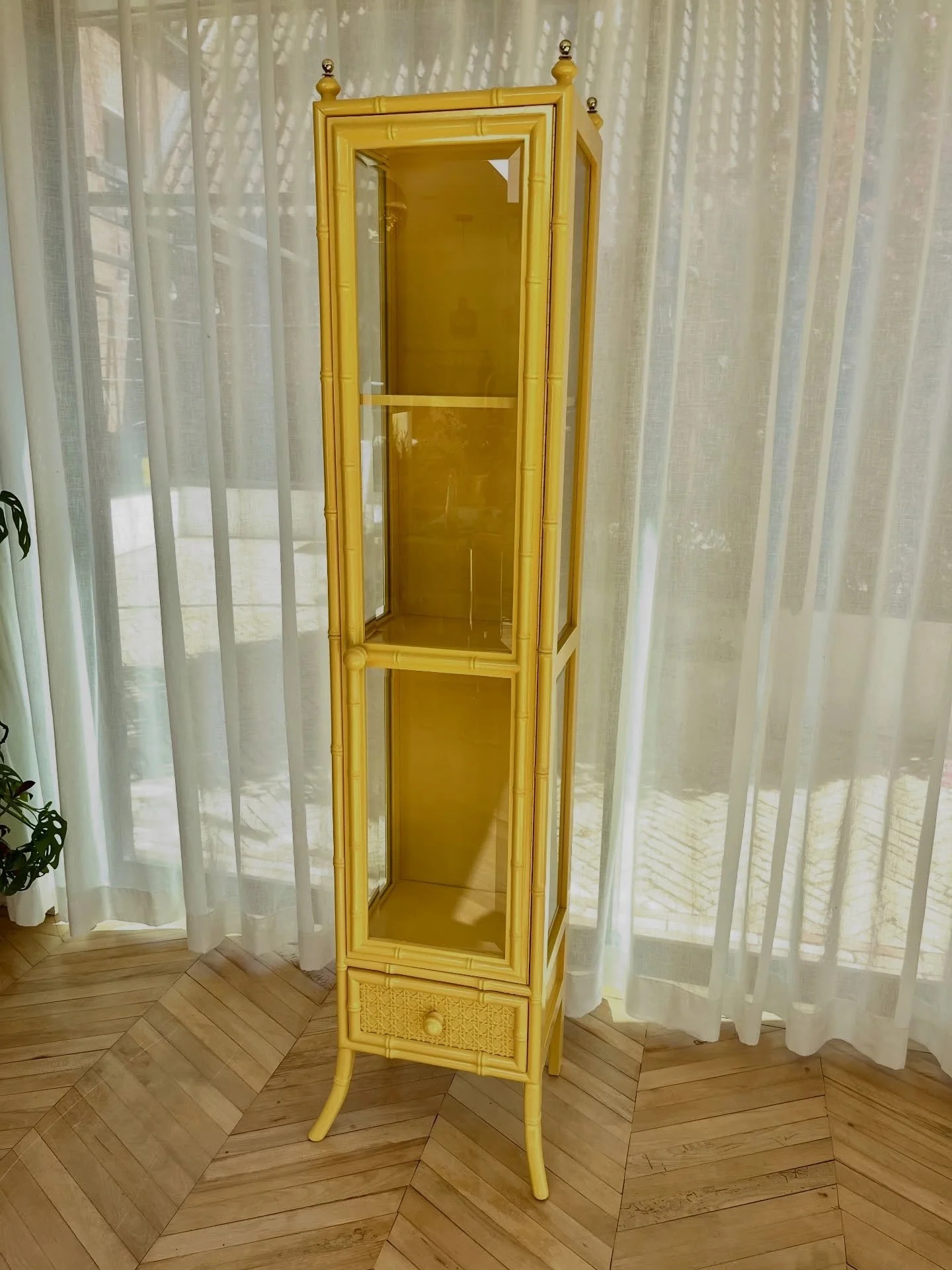 Yellow Lacquered Tall Faux Bamboo Glass Display Cabinet
A sunny yellow lacquered cabinet would bring joy to any interior. This unusual piece is such a rare find, and has been newly lacquered in Little Greene Gaillo yellow.

The cabinet has both a gla