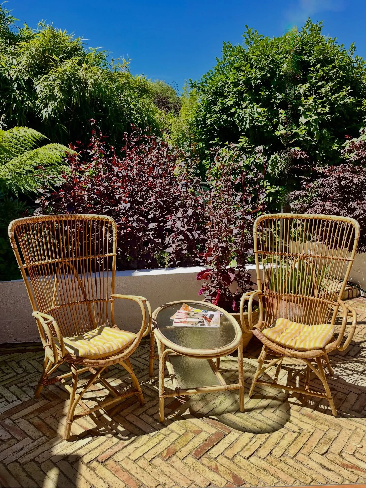 The season for lounging, and I can&rsquo;t believe these haven&rsquo;t been snapped up. 

Pair of Mid Century Wing Back Bamboo Occasional Chairs
Amazing condition, pair of bamboo high-back lounge chairs. These original 1970s chairs in the style of Ro