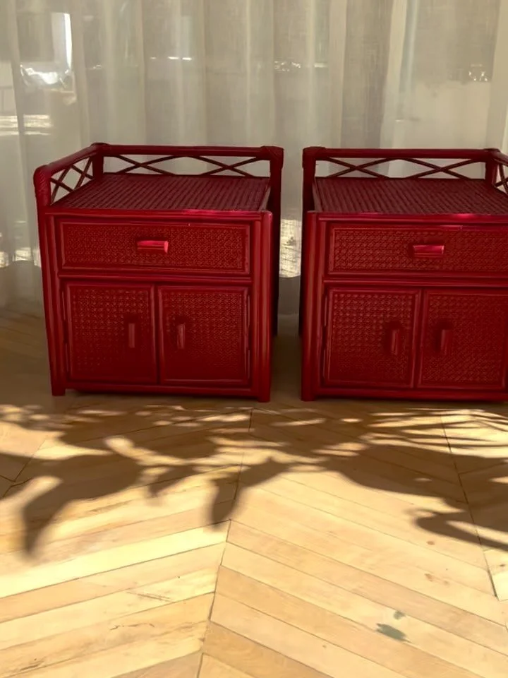 STILL AVAILABLE 
Beautiful and rare pair of left and right woven cane bedside cabinets, brought back to life by being lacquered in Little Greene intelligent gloss - Theatre Red.

Both are made up of one drawer and a two-door cupboard below. So there 
