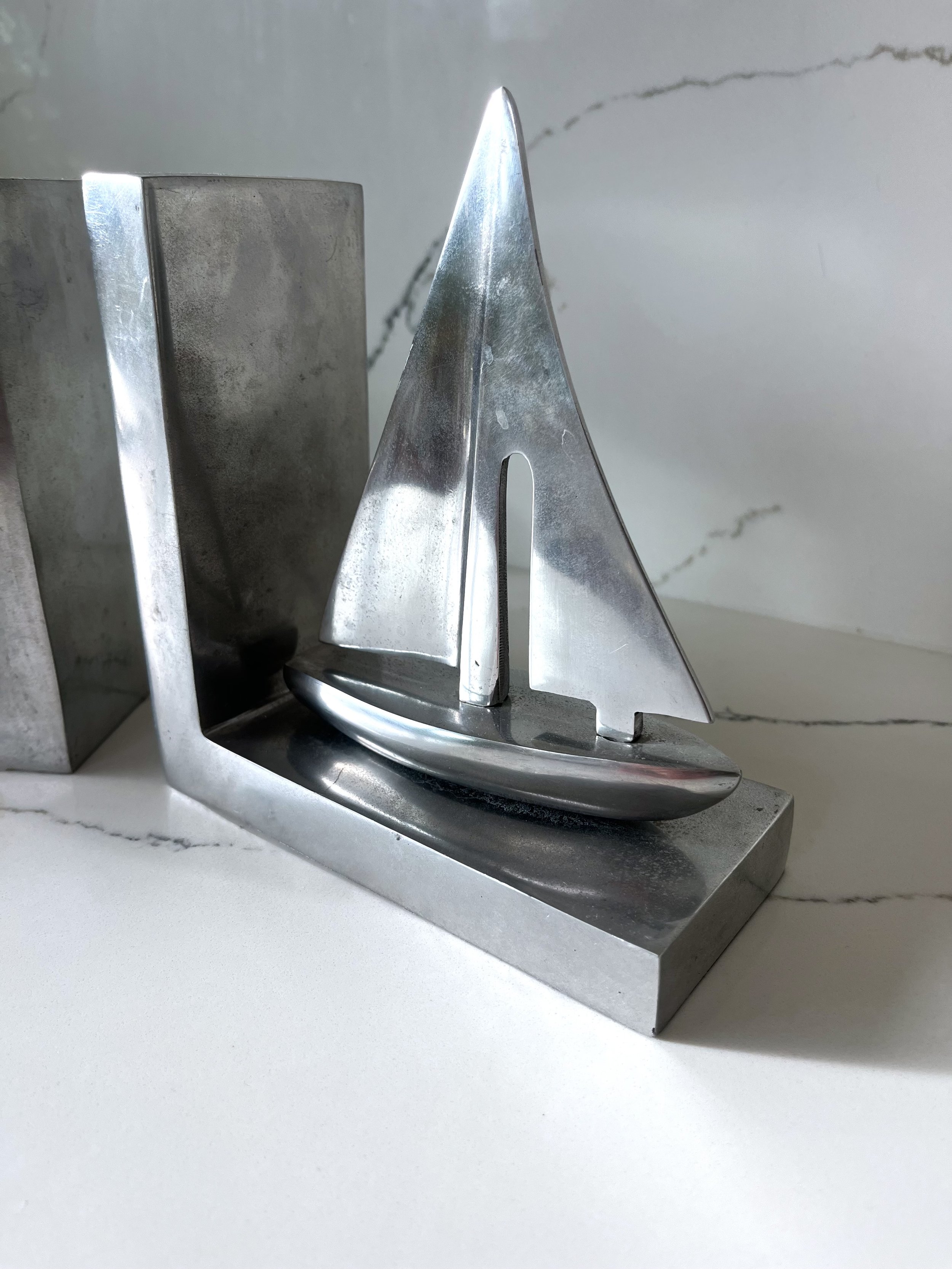 Pair of chrome boat bookends 2.jpeg