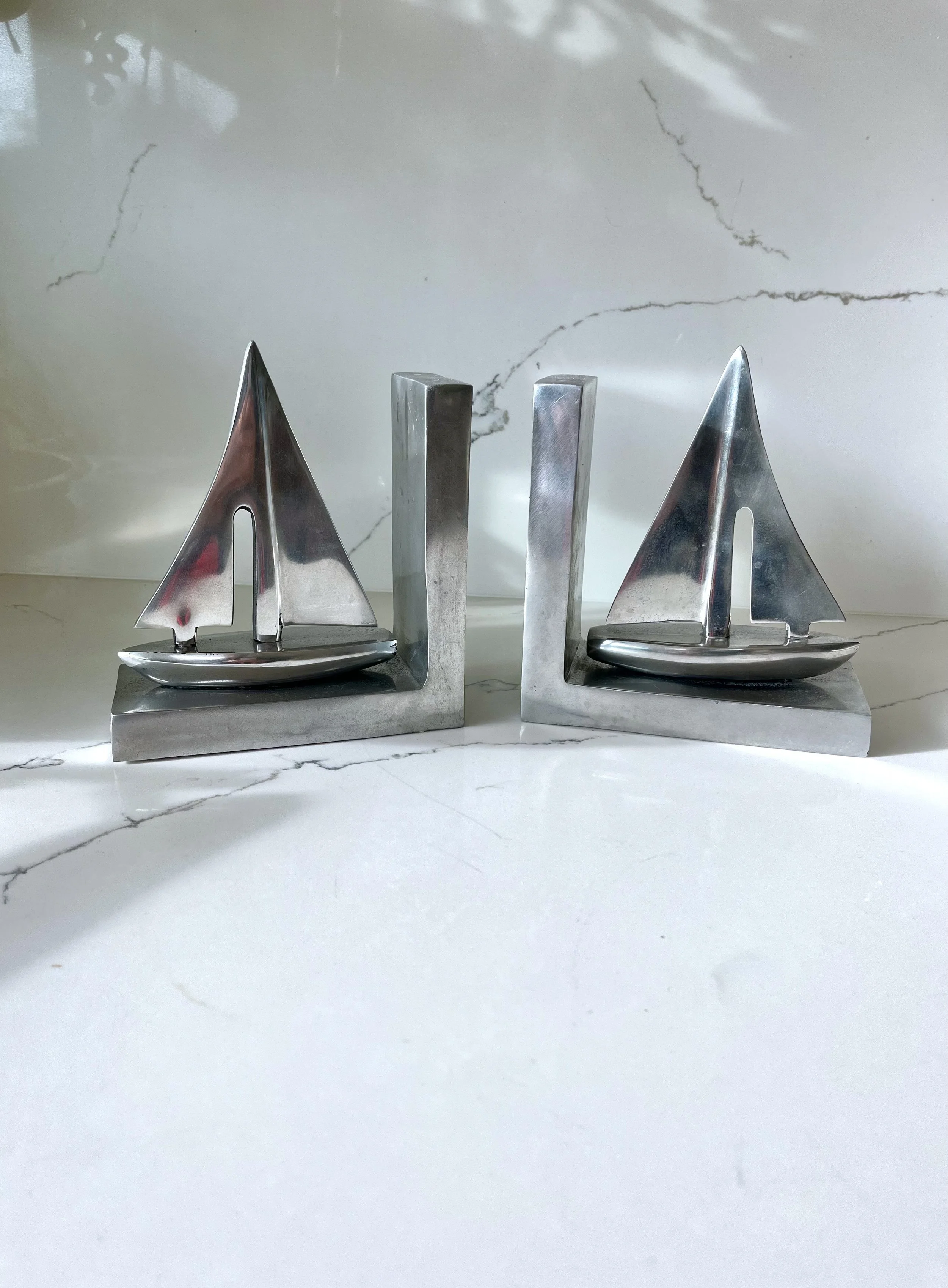 Pair of chrome boat bookends 1.jpeg