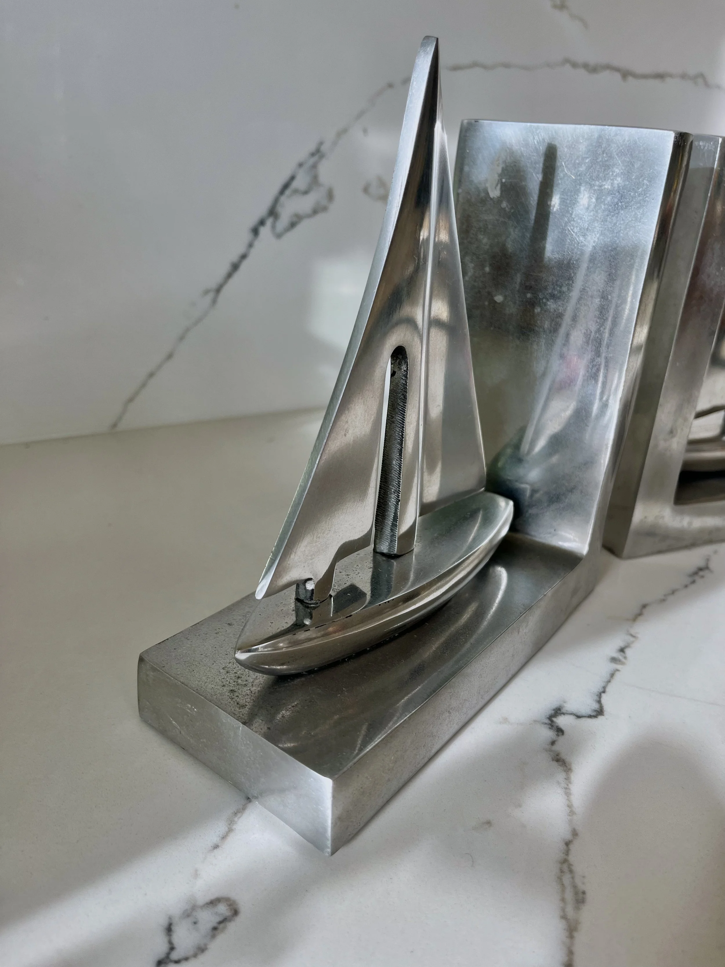 Pair of chrome boat bookends 3.jpeg