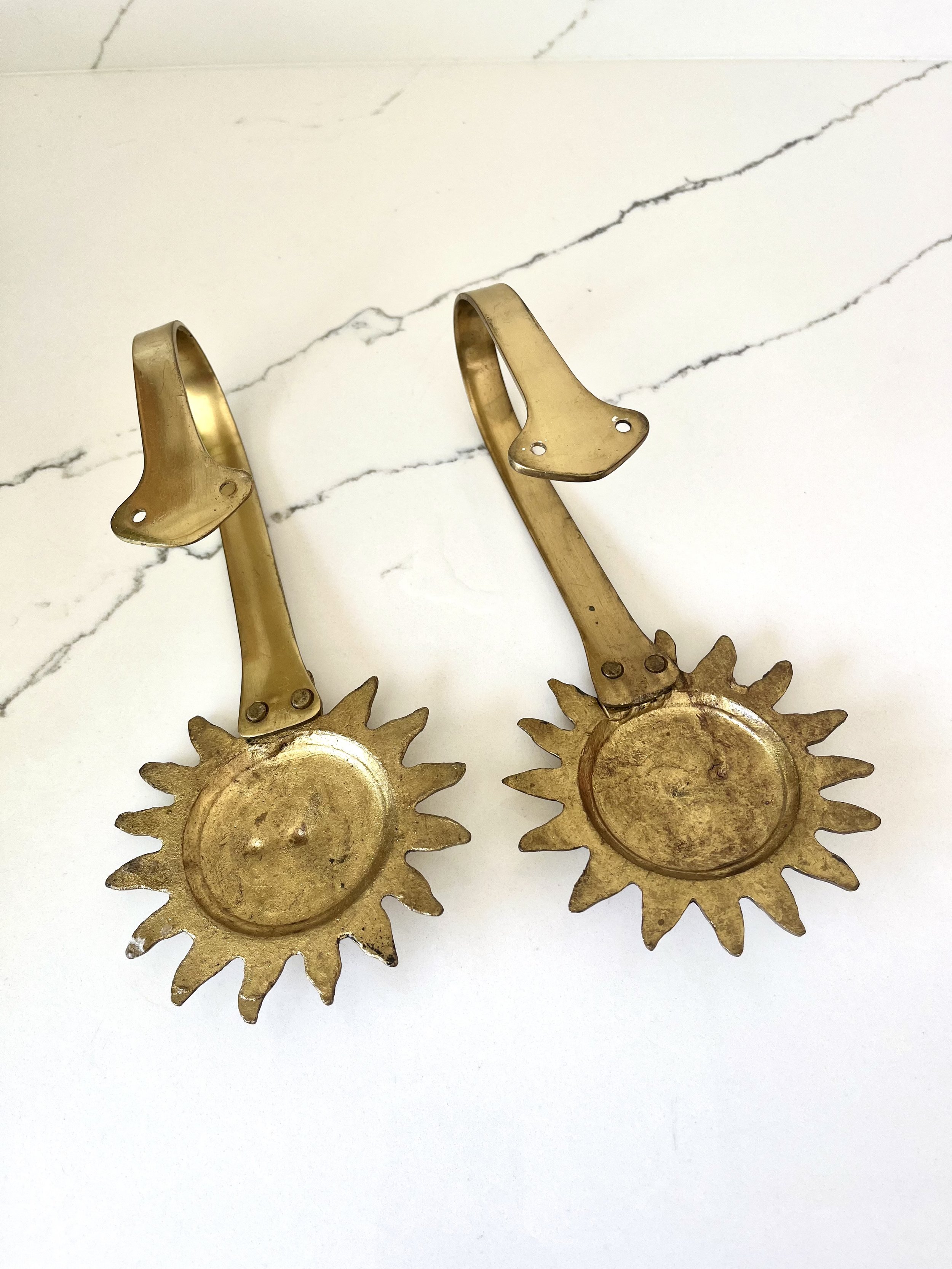 Pair of brass sun face curtain tie backs 4.jpeg