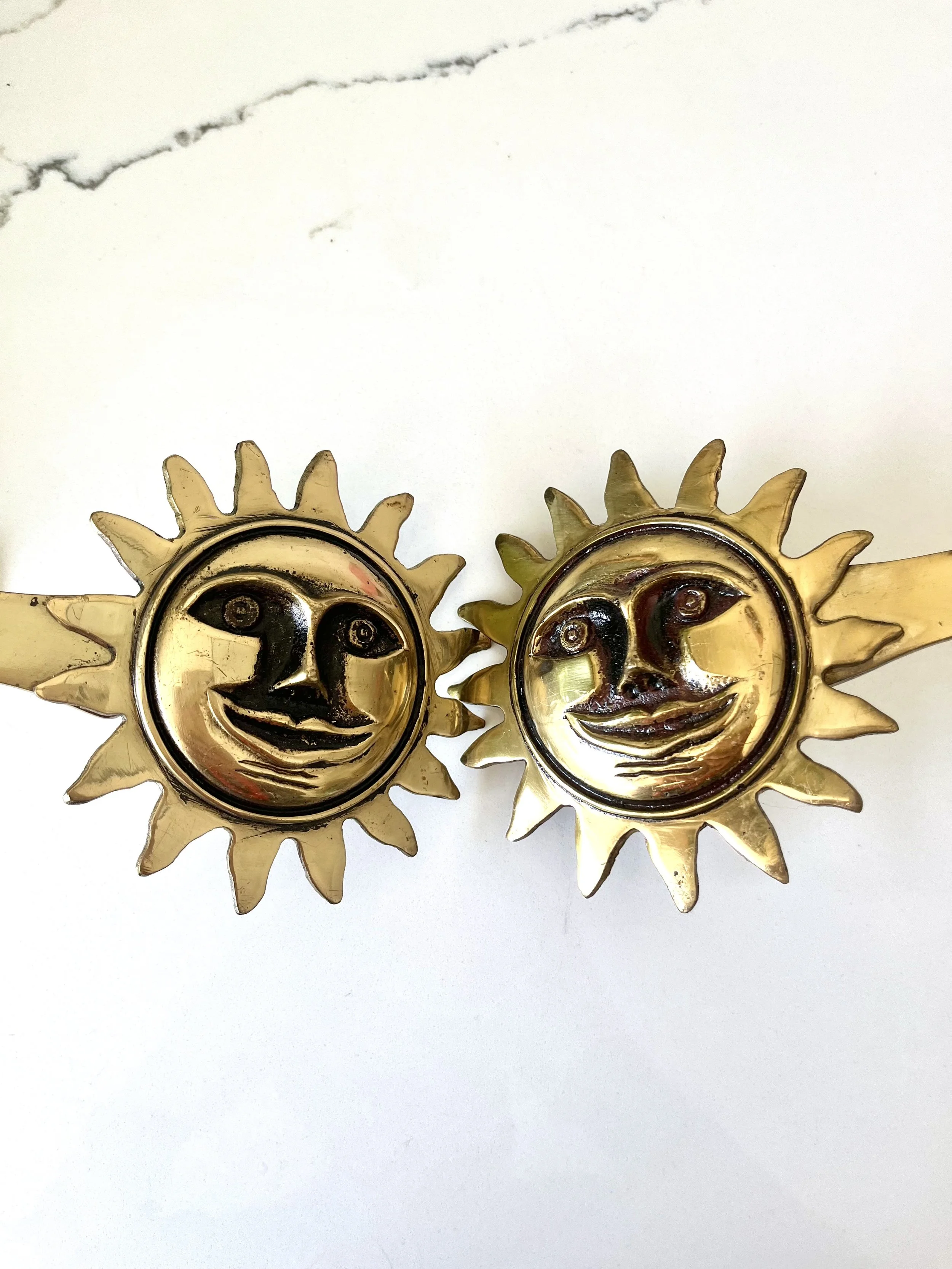 Pair of brass sun face curtain tie backs 7.jpeg