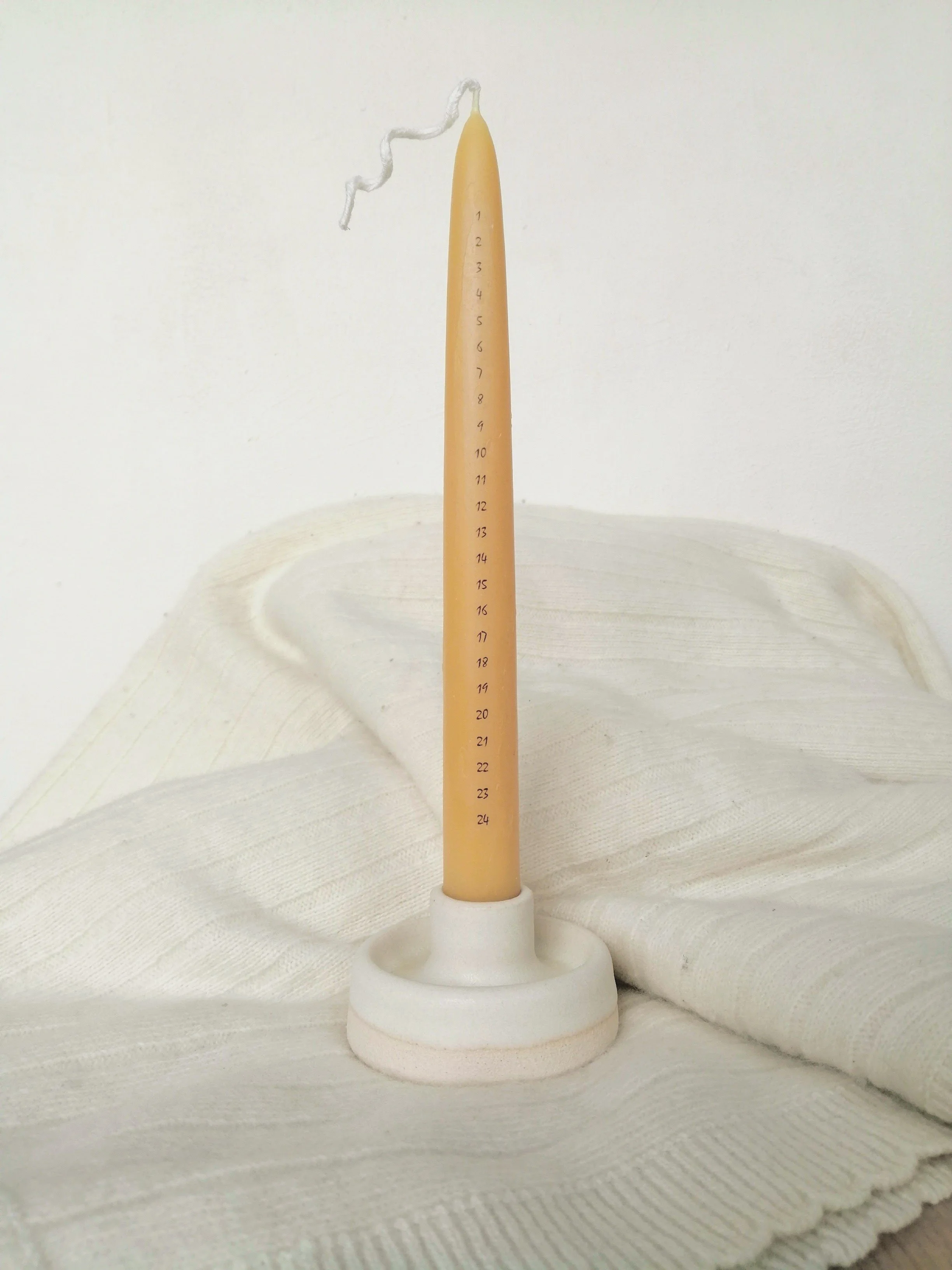 White Advent Candle with blanket.jpg