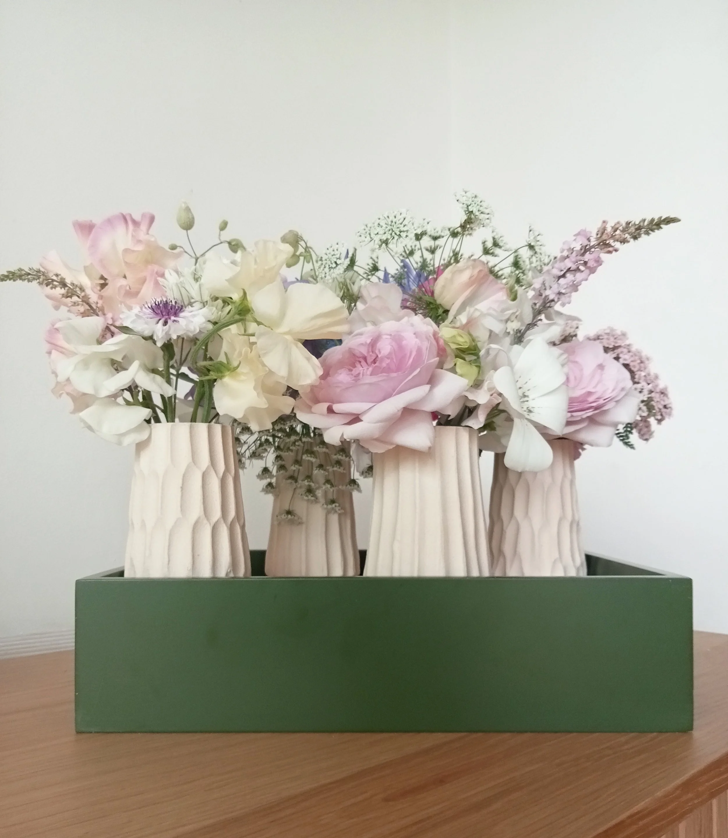 Handmade stripe and origami pottery vases