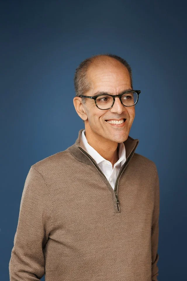 Dr. Cogle smiling profile image taken by Adrienne Fletcher Photography