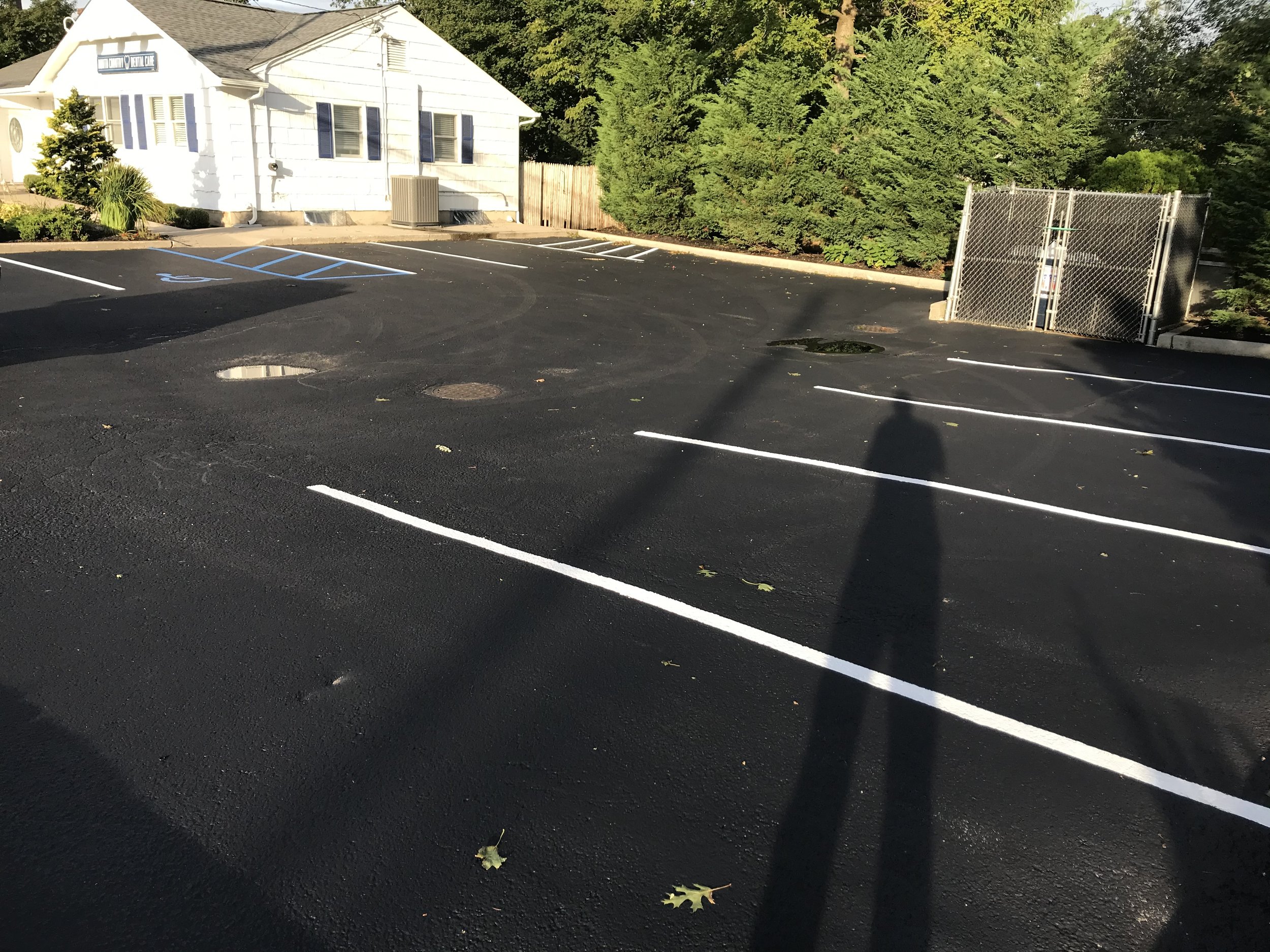 commercial parking sealcoating and striping.jpeg
