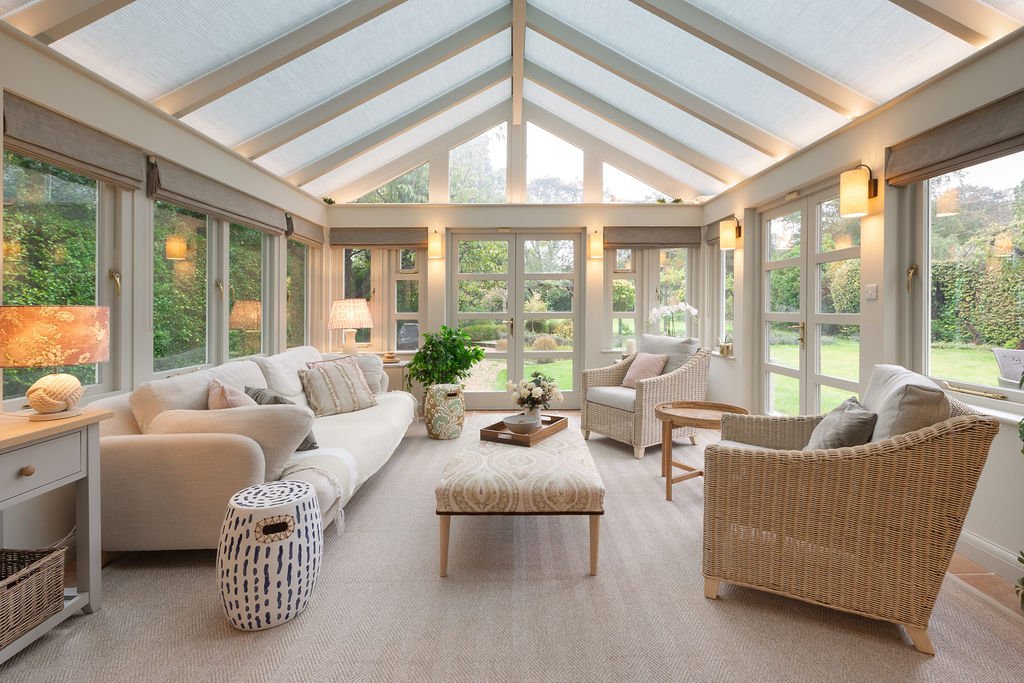 Electric "honeycombed" blind warm up the space in winter and cool it down/reduce glare in summer. These are almost always in use. The huge 'natural flooring' rug is made of polypropylene and can be scrubbed, wiped, and if necessary taken outside an