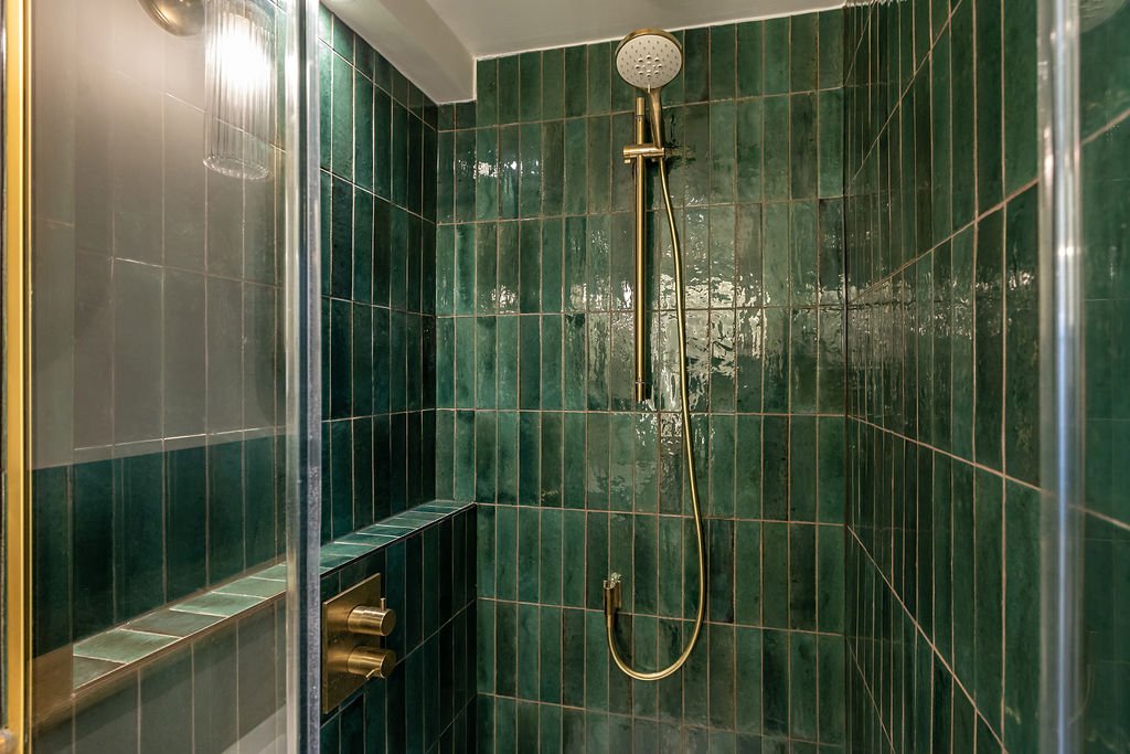 The shower has an inbuilt shelf (allowing even more elbow room above waist height and lighting to ensure a spacious feel.