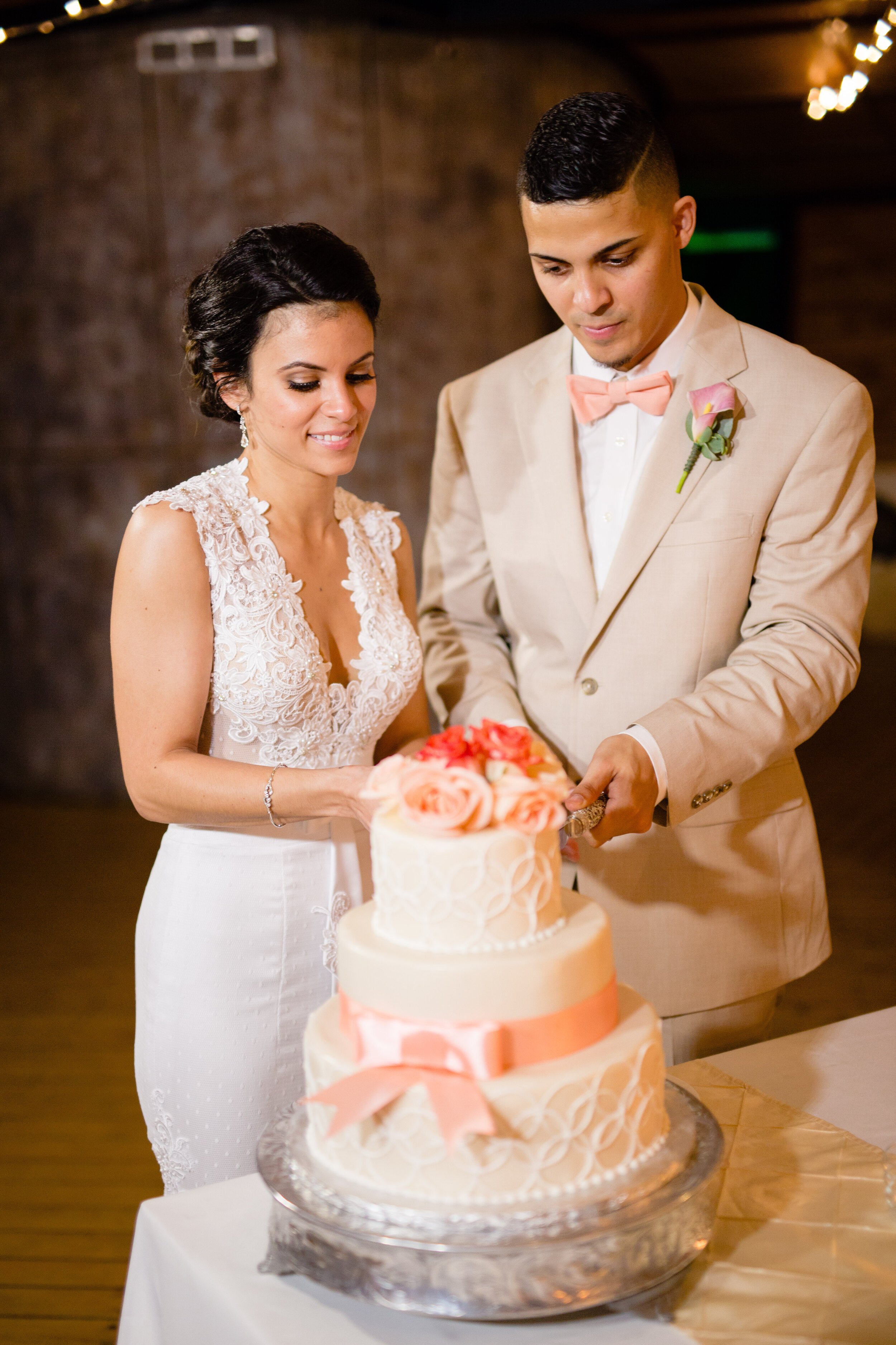wedding-couple-cutting-cake-bride-and-groom-wedding-cake.jpg