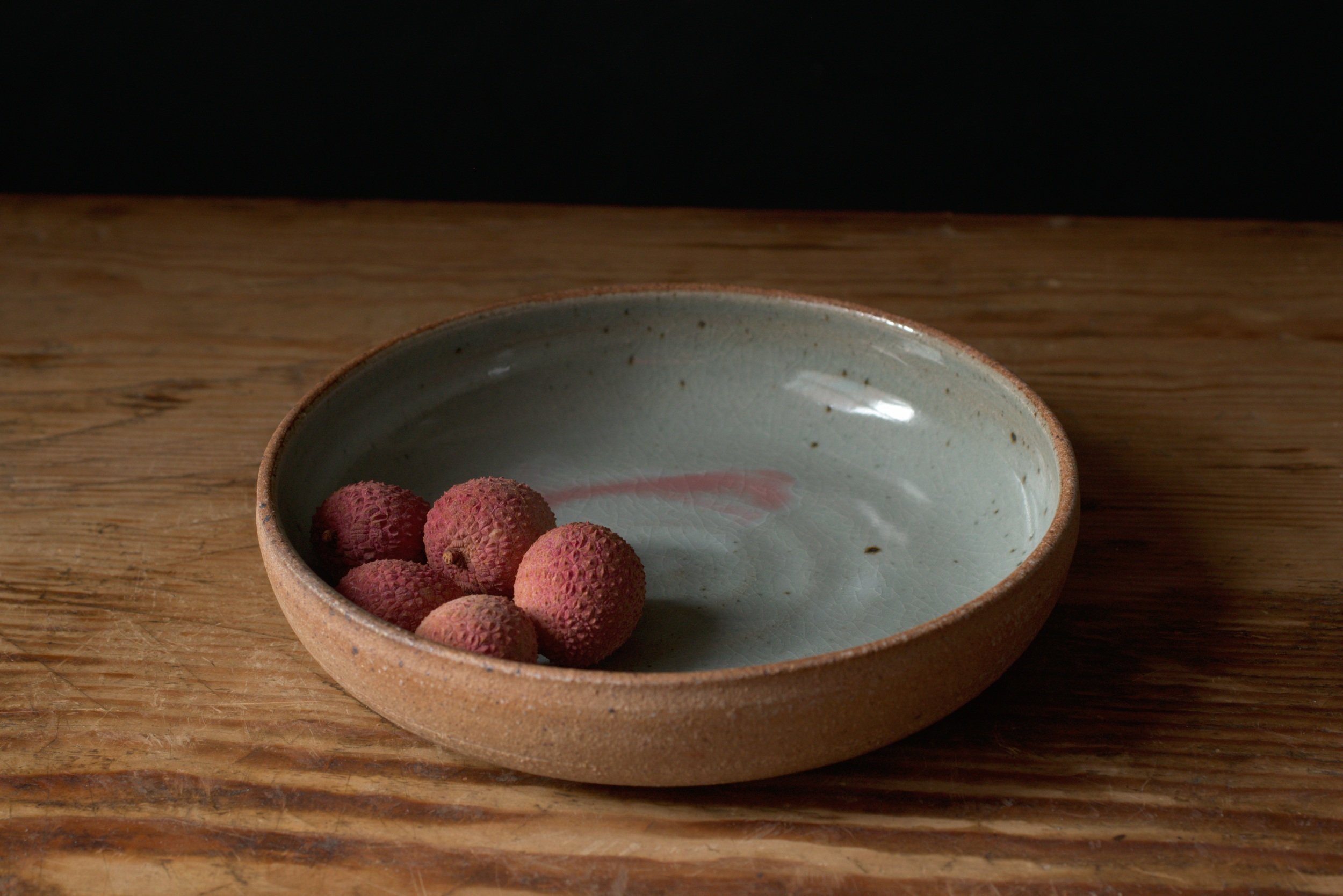 A single celadon pasta bowl