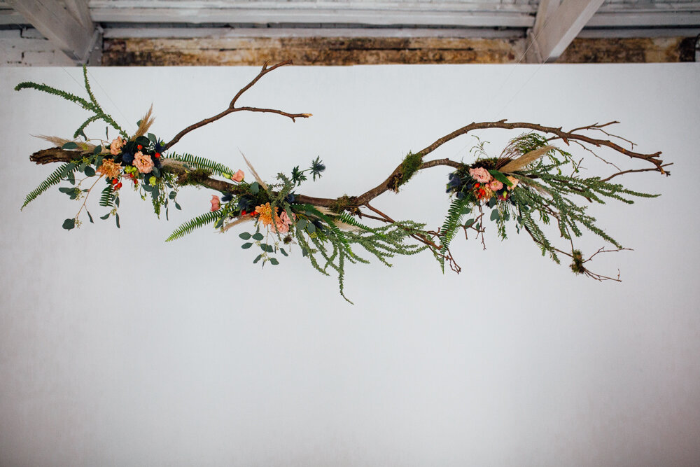 A floral branch for a styled Sheffield wedding shoot