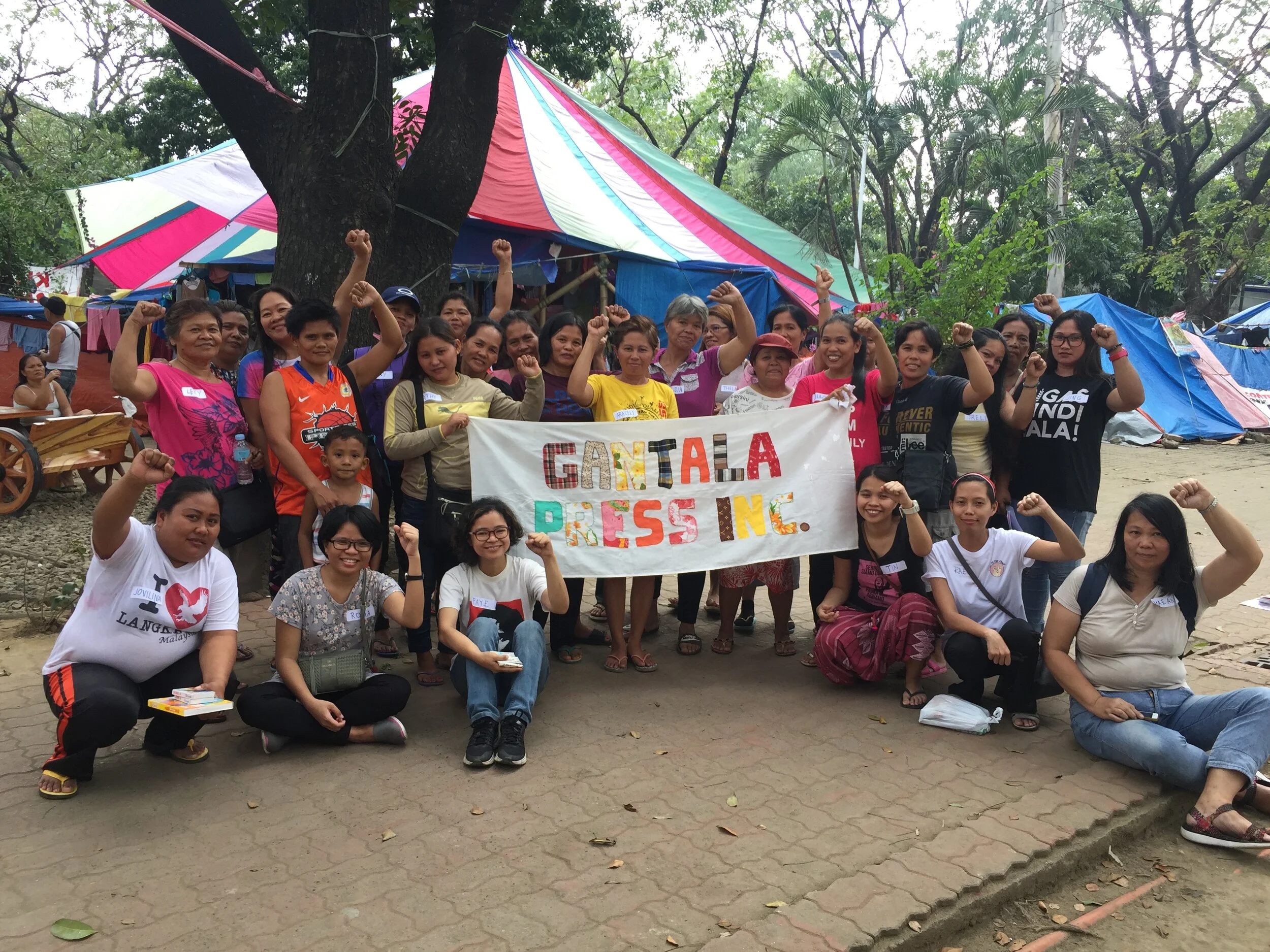 01. With Plantation Workers after Writing Session.JPG