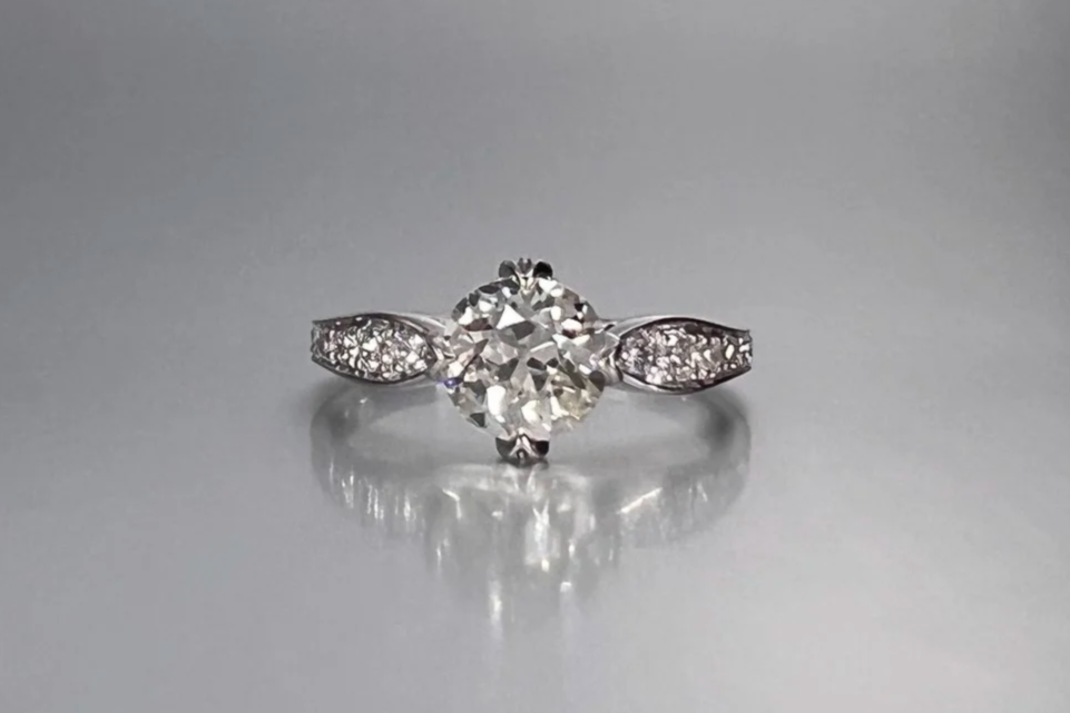 Custom platinum engagement ring featuring a 1.39 ct Old European cut natural diamond with pavé single-cut natural diamond accents.