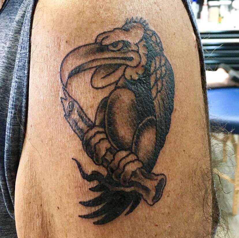 Angry Vulture by @tattoosbyzak! Call or stop by the shop to book an appointment 209-432-8945. 

#cartoonart #vulturetattoo #blackandgreytattoo #blackworktattoo #traditionaltattoo #cartoontattoo #birdsofprey #tattoo #tattoos #tattooideas #tattooflash 