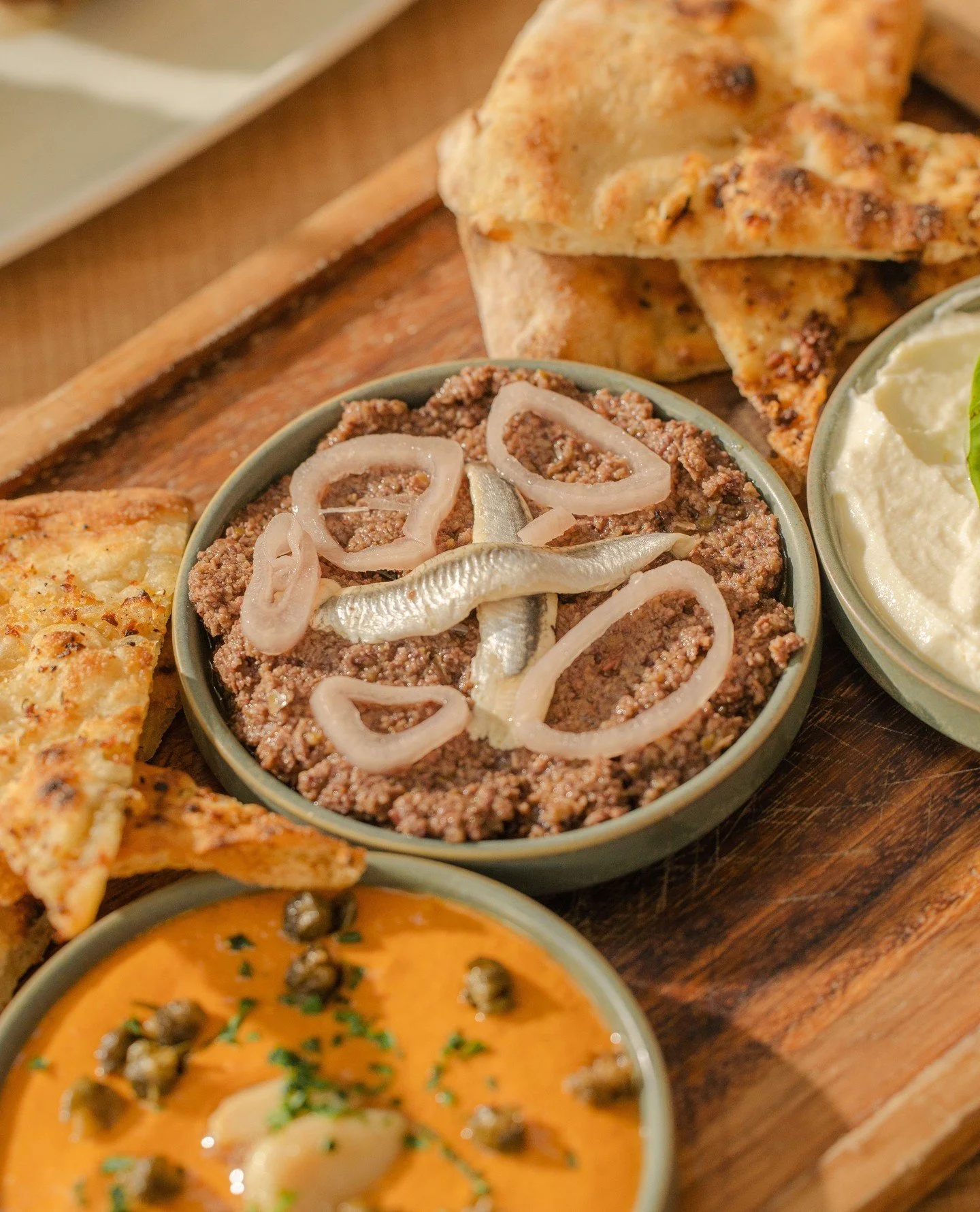 A night out with friends isn&rsquo;t complete without our Dip Trio!⁠
⁠
Featuring whipped ricotta, roasted red pepper, and smoked olive, it&rsquo;s the perfect start to any meal. ⁠
⁠
Delicious bites, great company&mdash;what more could you need?