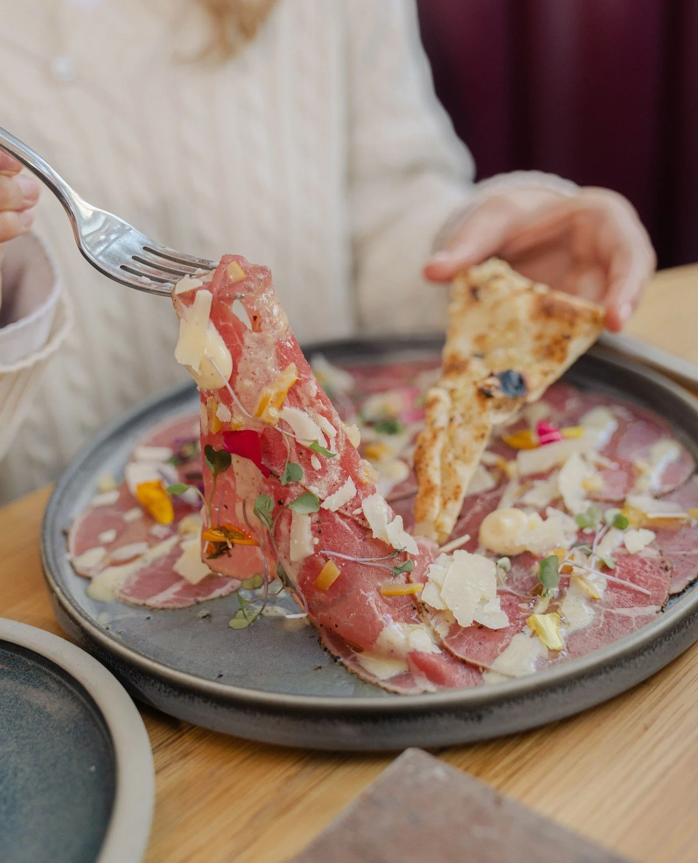 A dish that makes us all feel luxurious.⁠
⁠
Beef Carpaccio, inspired by the bold colours of painter Vittore Carpaccio, this dish of thinly sliced raw beef became an instant classic!⁠
⁠
Our take on it includes: beef, pickled mustard seeds, greens, aio