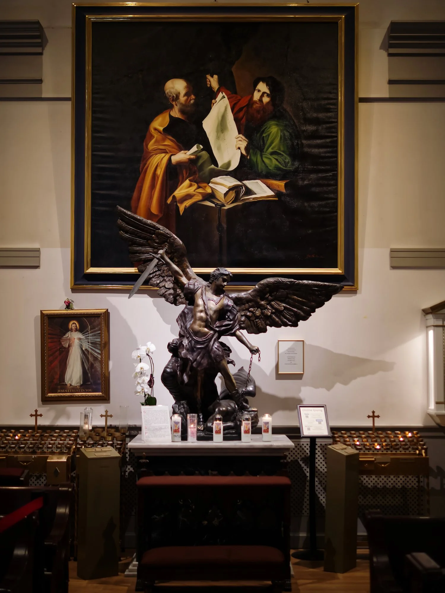 Archangel Michael defeats Satan in this sculpture at the Church of St. Agnes