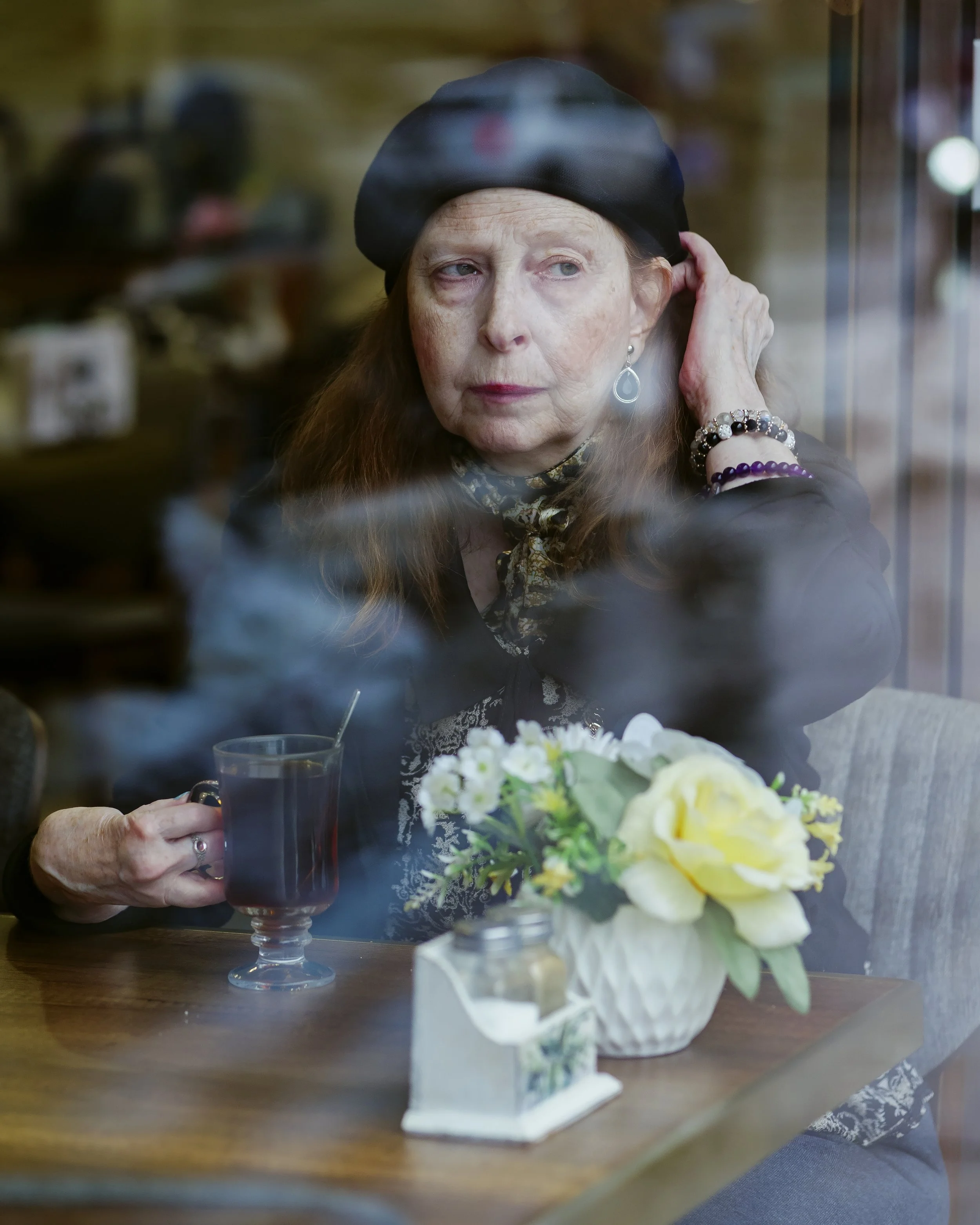 Candid lifestyle and street portraiture in NYC. Authentic environmental portraits, urban cafe scenes, and storytelling photography by WPR.Creative