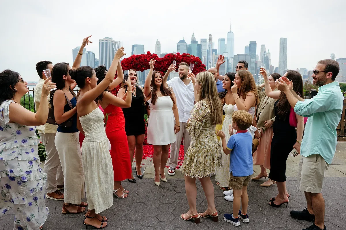 NYC surprise proposal celebration with friends and family in New York City - WPR Creative
