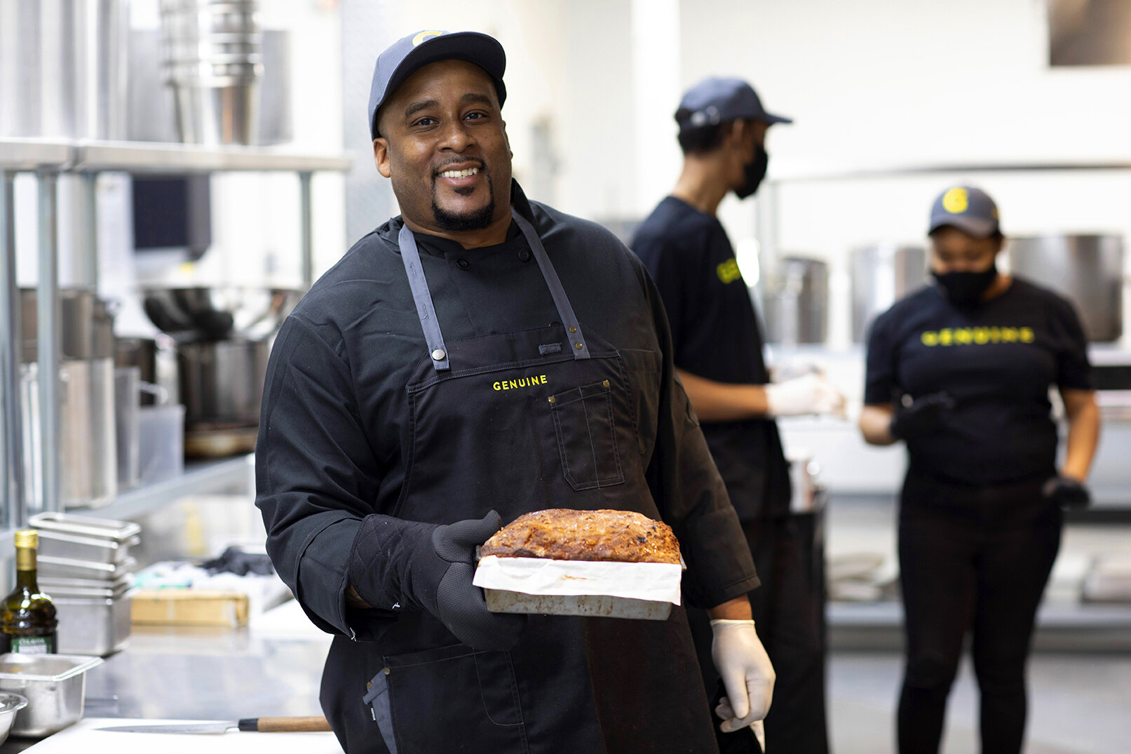 Man smiling holding food