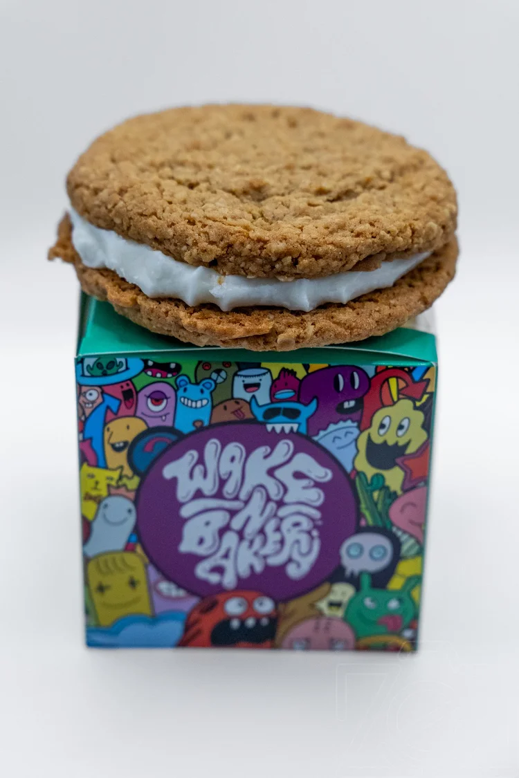 Oatmeal cream pie photographed on a branded Wake N Bake box