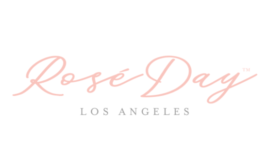 Pink script text reading 'Rosé Day' above smaller black text reading 'Los Angeles'.