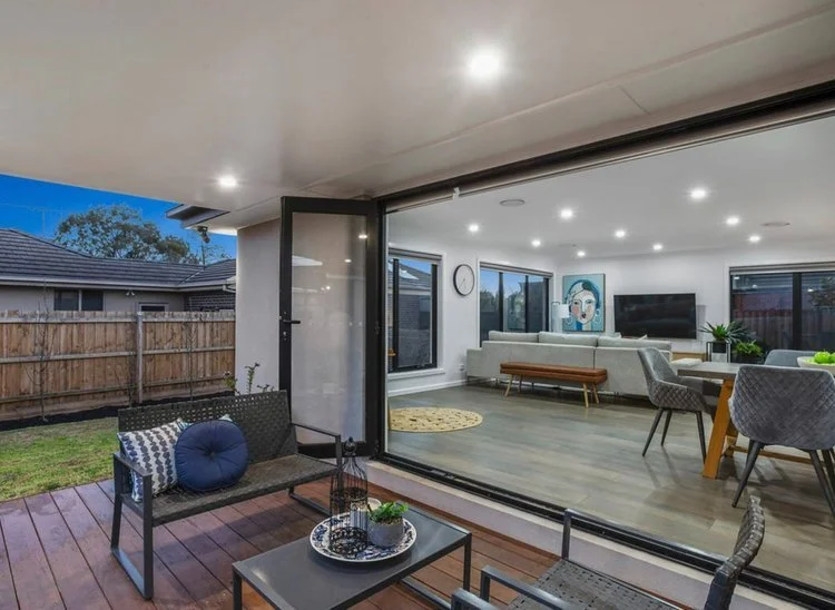 Stunning home lighting setup, blending indoor and outdoor spaces with lighting solutions