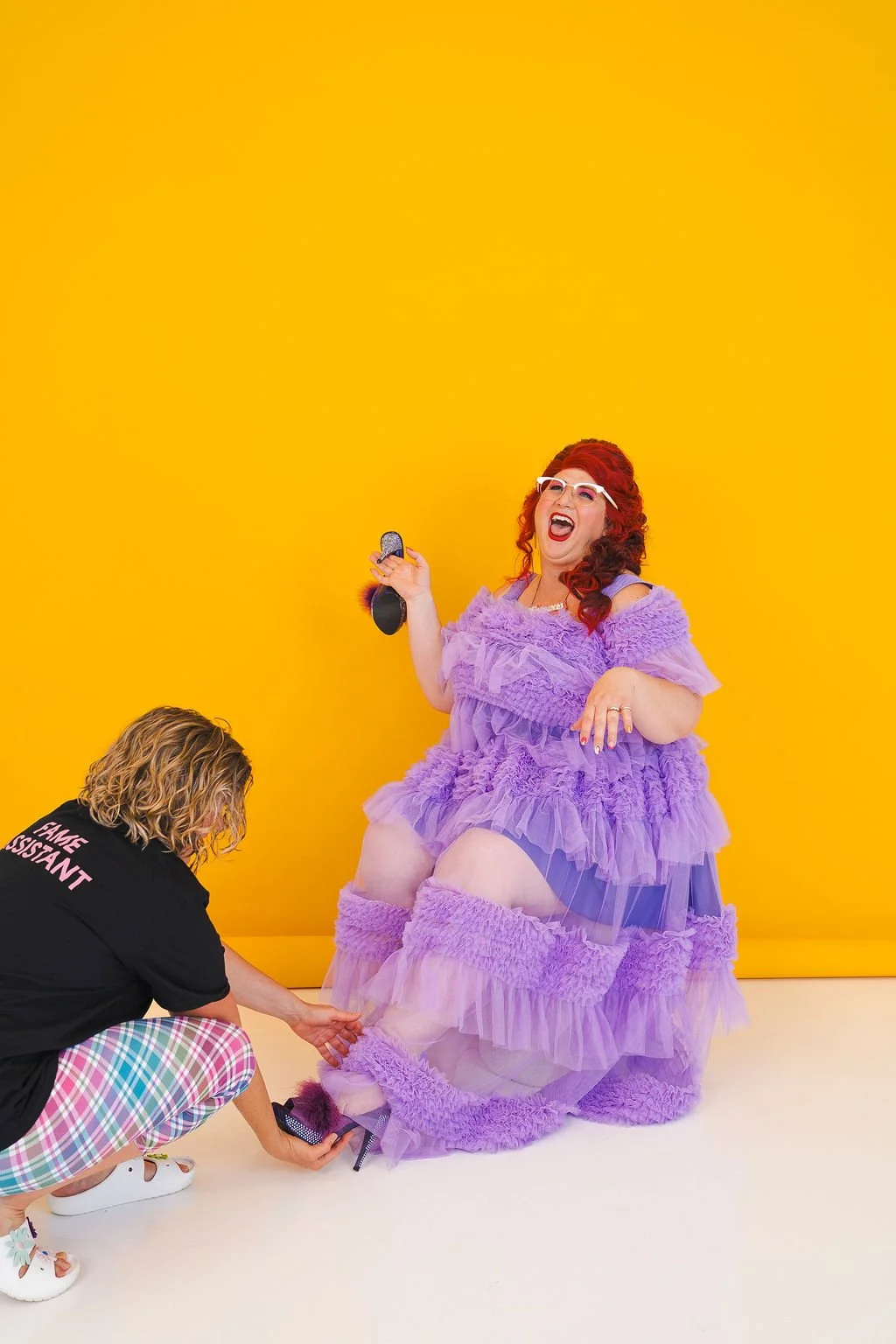 Famous Sharron_BTS Purple Holding shoe_WS.jpg