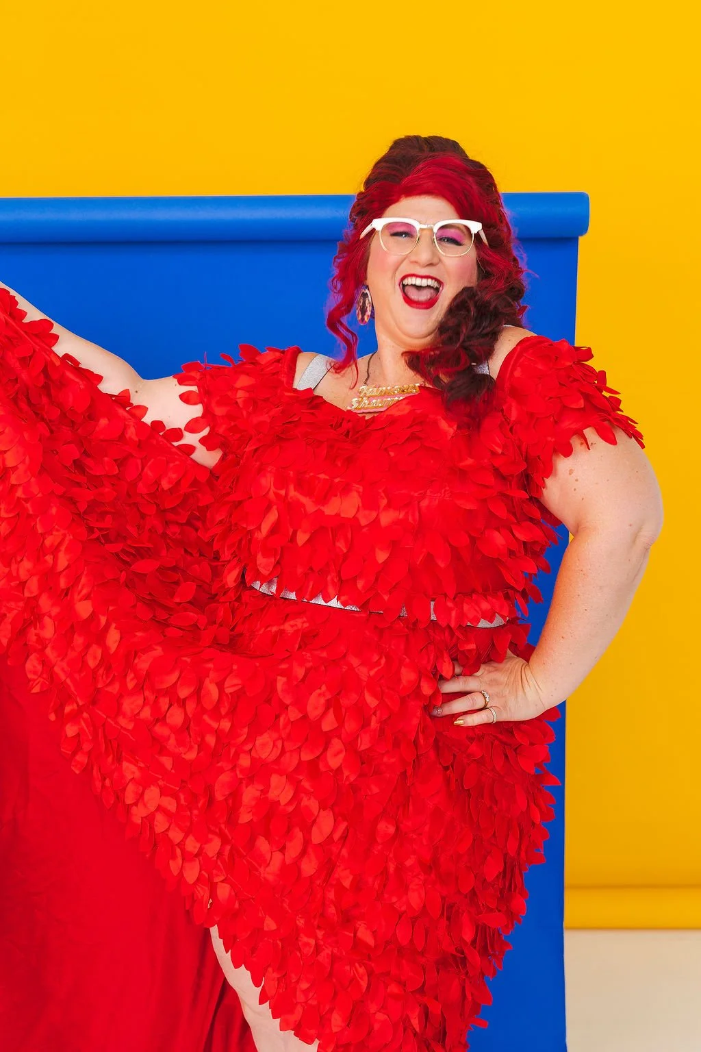 Famous Sharron_POSED Red Dress Blue Bk Yessss_WS.jpg
