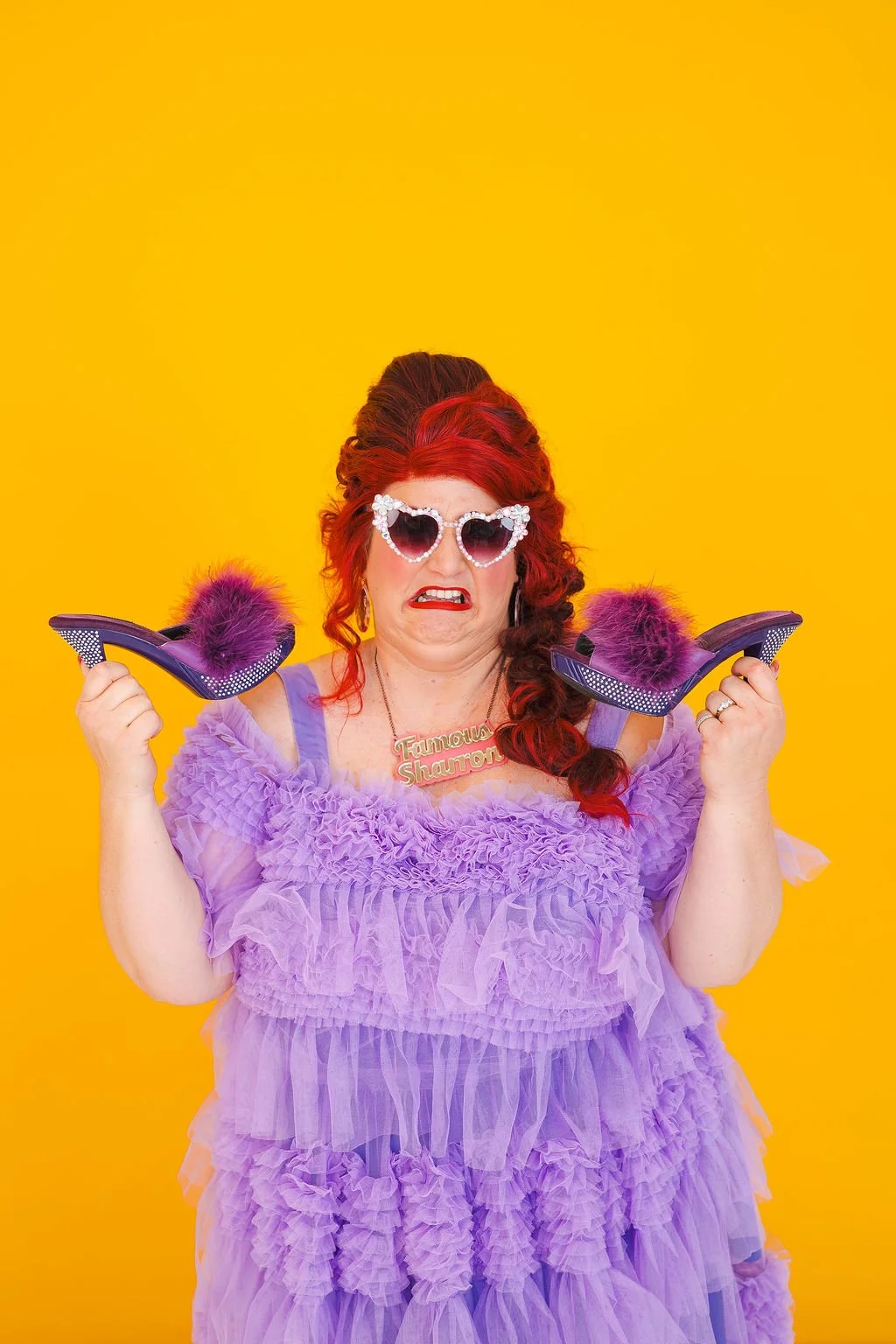 Famous Sharron_POSED Purple Dress Shoes Glasses Grimace_WS.jpg