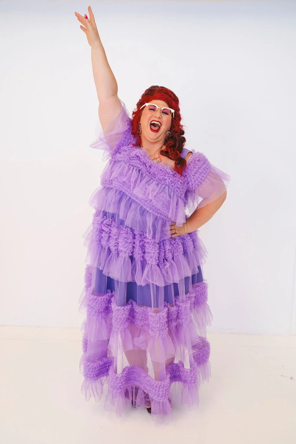 Famous Sharron_CLASSIC Purple Dress Excited Point and Pose_WS.jpg