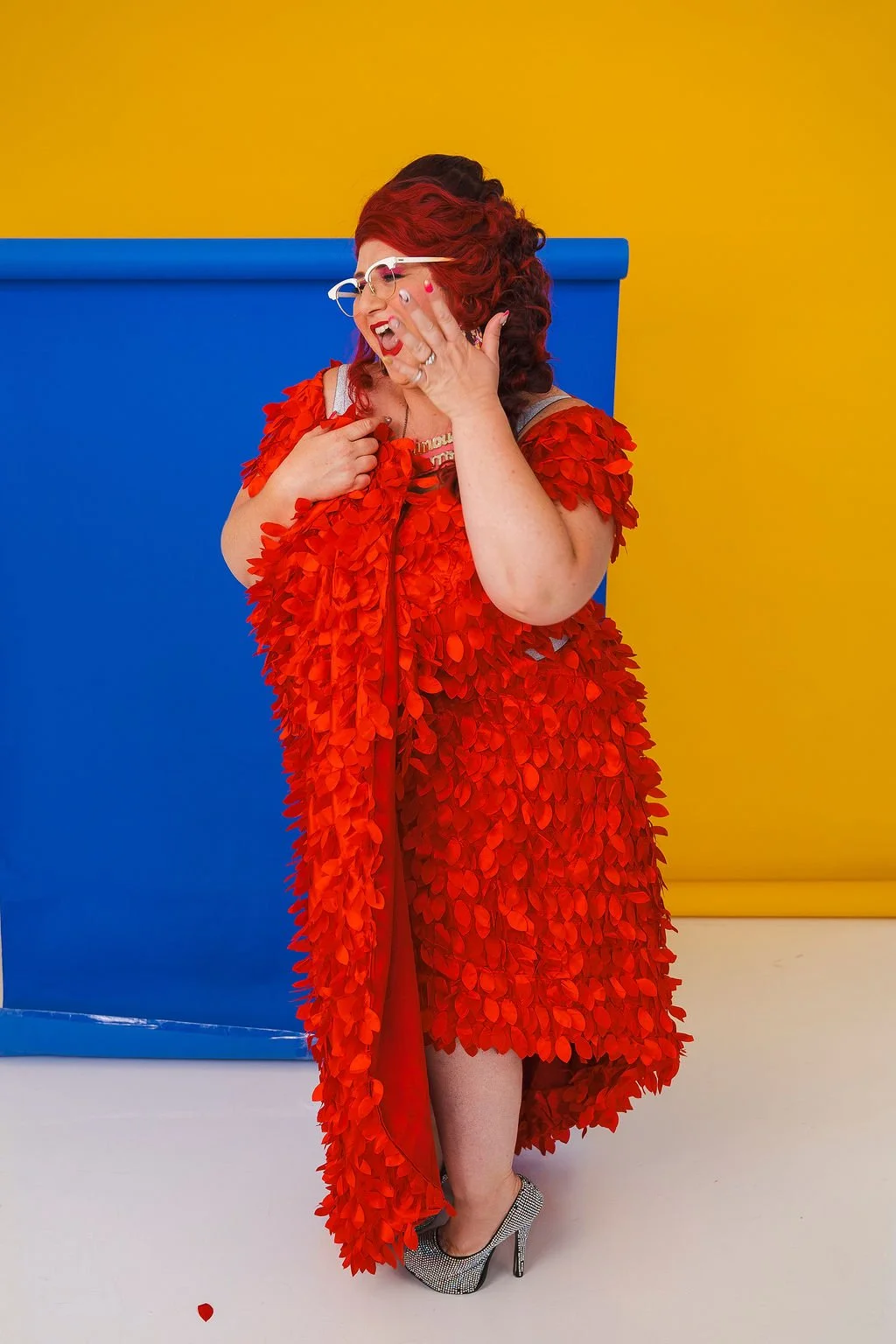 Famous Sharron_POSED Red Dress Blue Bk Oh me?_WS.jpg