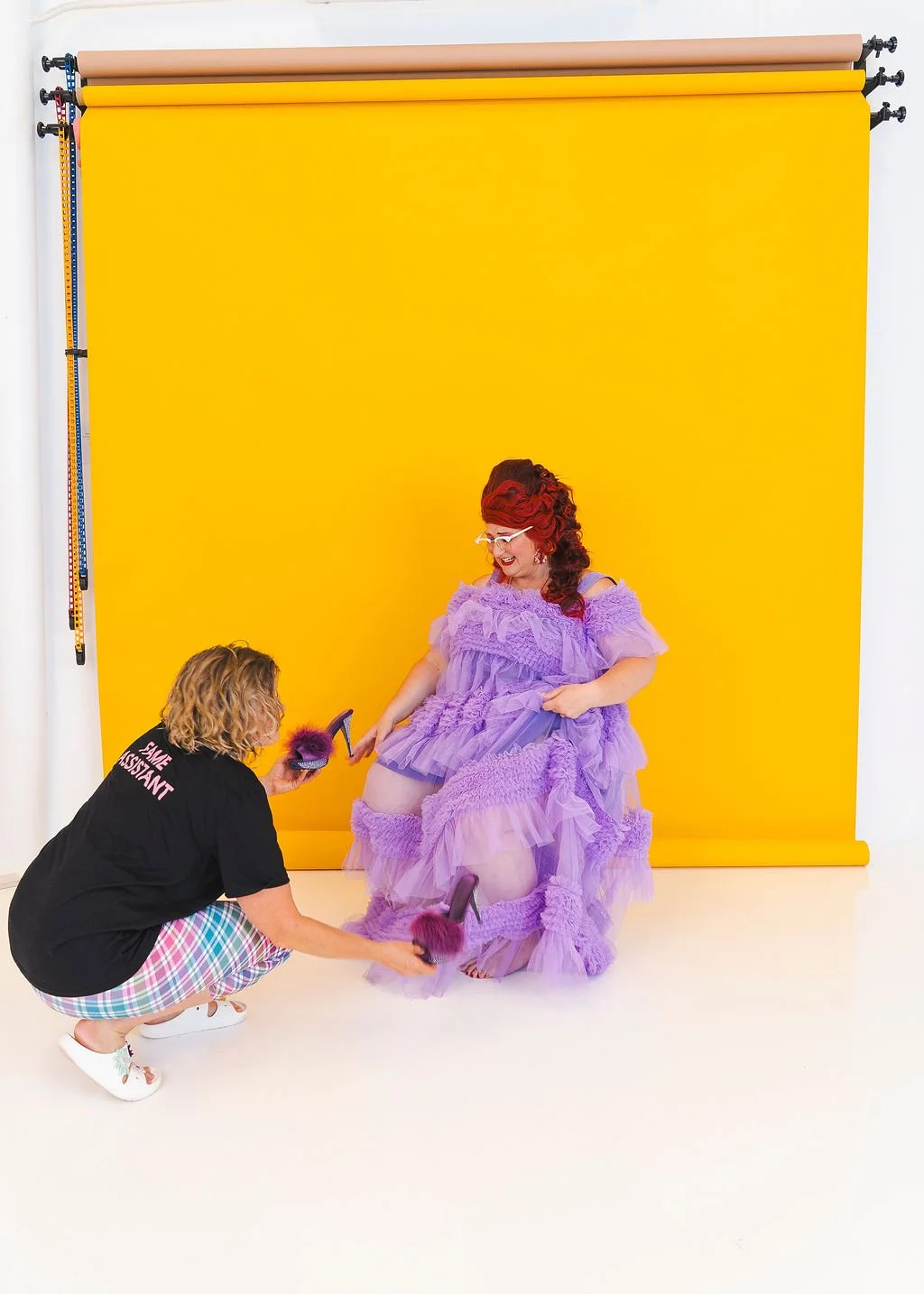 Famous Sharron_BTS_Purple Shoe Fitting_WS.jpg