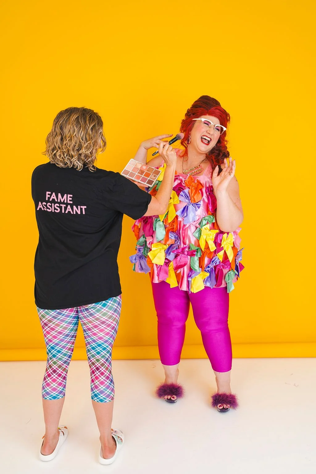 Famous Sharron_BTS Bows Makeup Laughing_WS.jpg