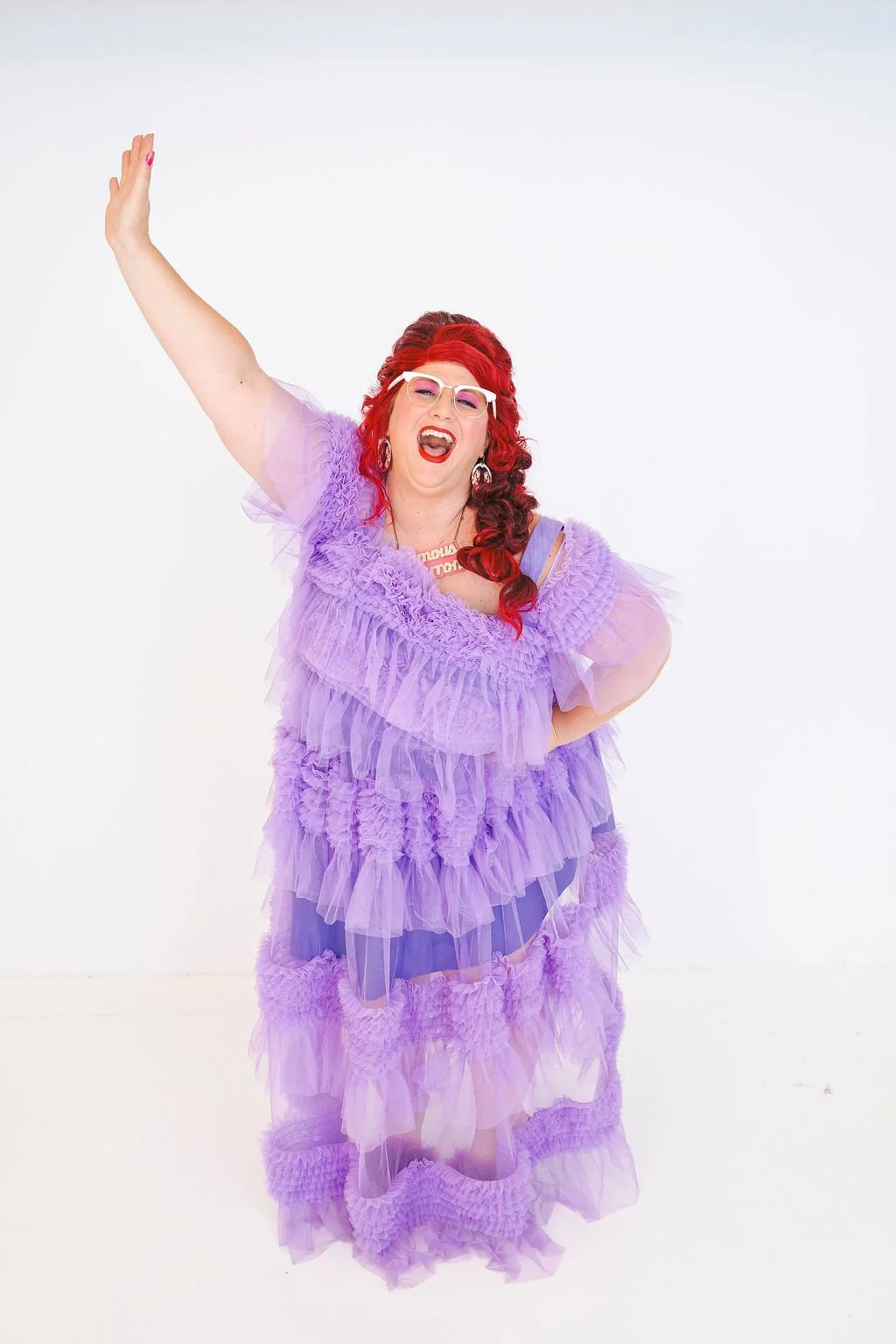 Famous Sharron_CLASSIC Purple Dress Wave to Fans_WS.jpg