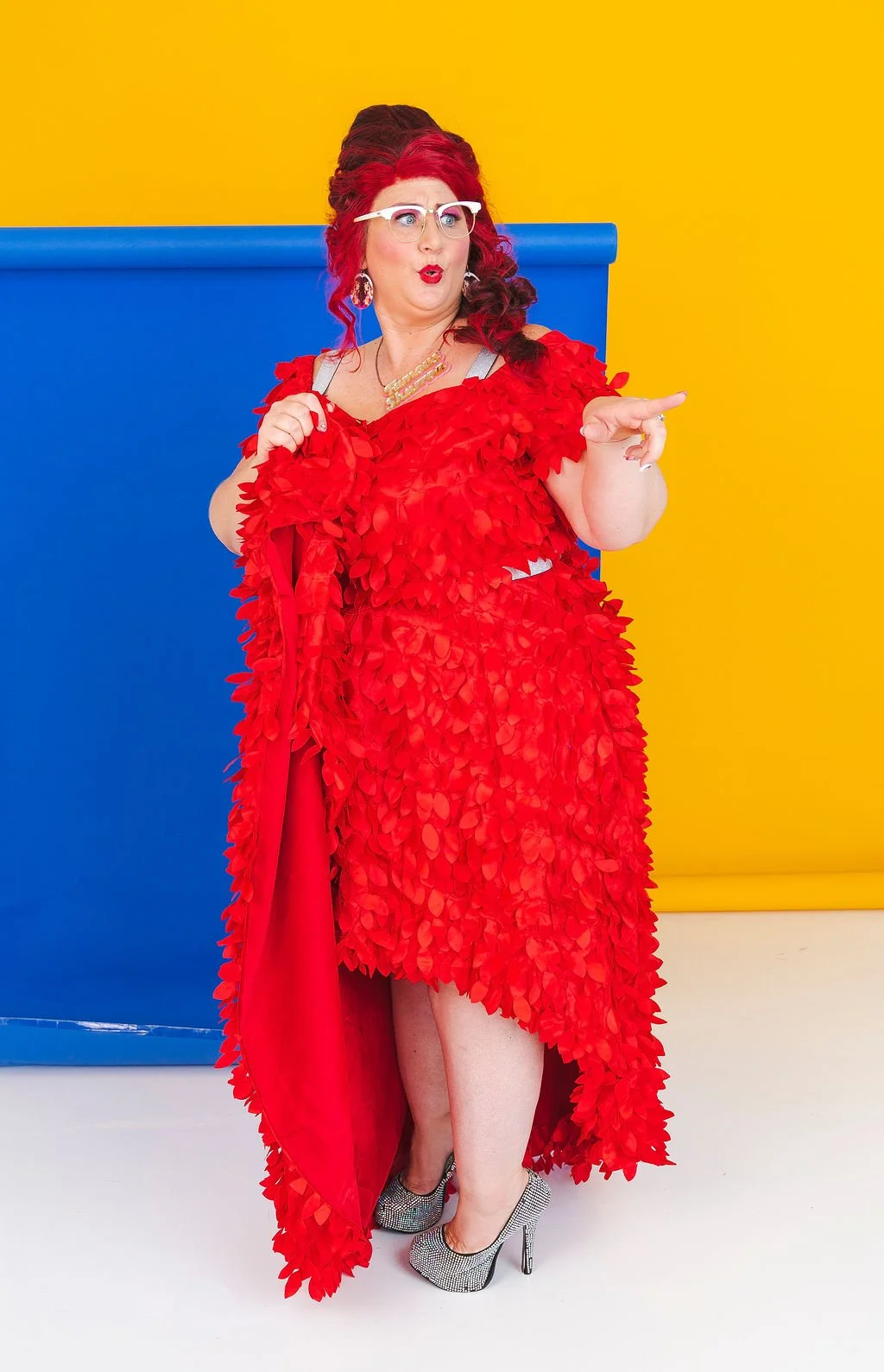 Famous Sharron_POSED Red Dress Blue Bk Over There_WS.jpg