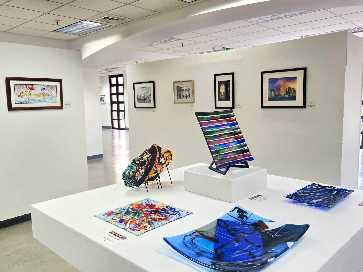 First peek at Hawaii Watercolor Society's (@hawaiiwatercolorsociety) beautiful 2026 Members' Show, "99% Transparent" and accompanying glasswork! 

This exhibition will be on view now through March 28 during regular gallery hours, Tues-Sun 1