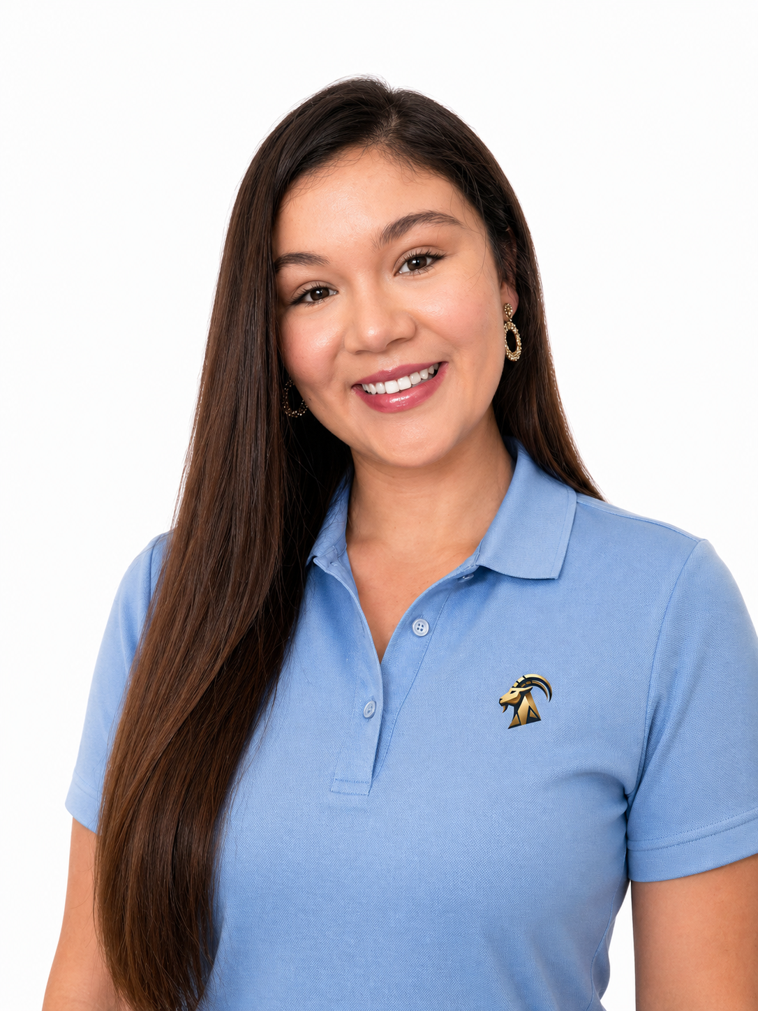 A woman with long brown hair, wearing a blue polo shirt with a Mitsubishi & Company logo, smiling and looking at the camera.