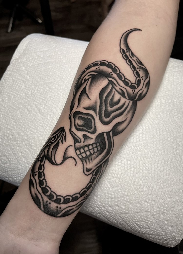 American Traditional skull with snake tattoo by Nick at Electric Street Tattoo, Fort Lauderdale