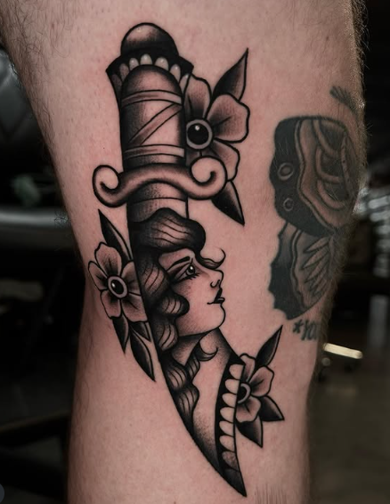 Dagger with flowers tattoo by Lexi at Electric Street Tattoo, Fort Lauderdale