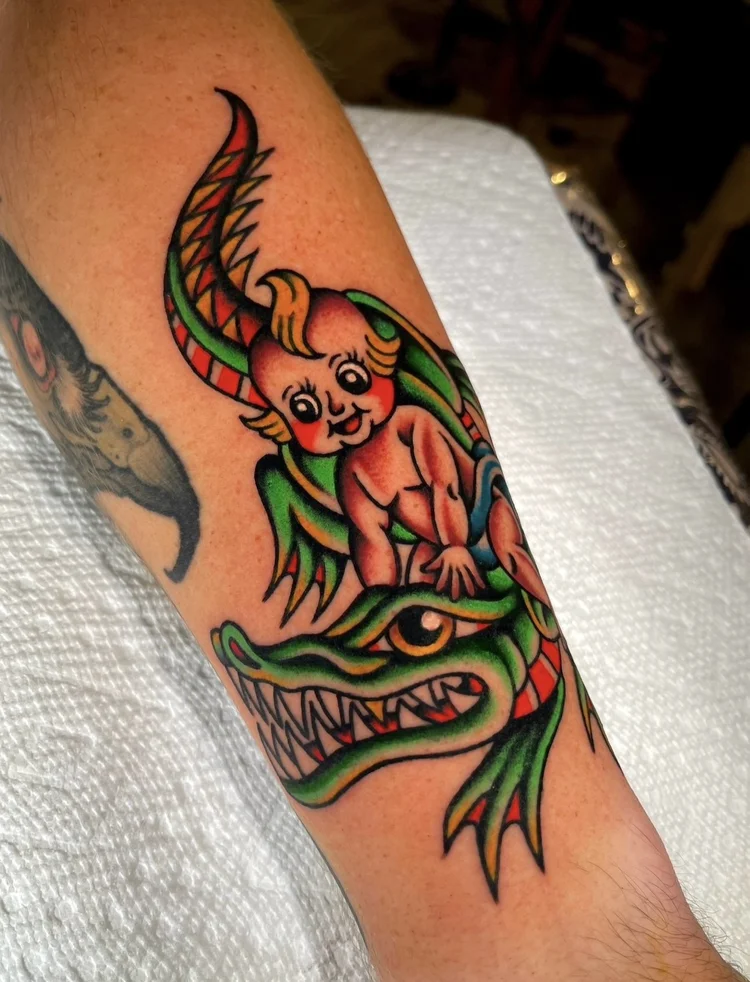 American Traditional devil riding an alligator tattoo by Nick at Electric Street Tattoo, Fort Lauderdale