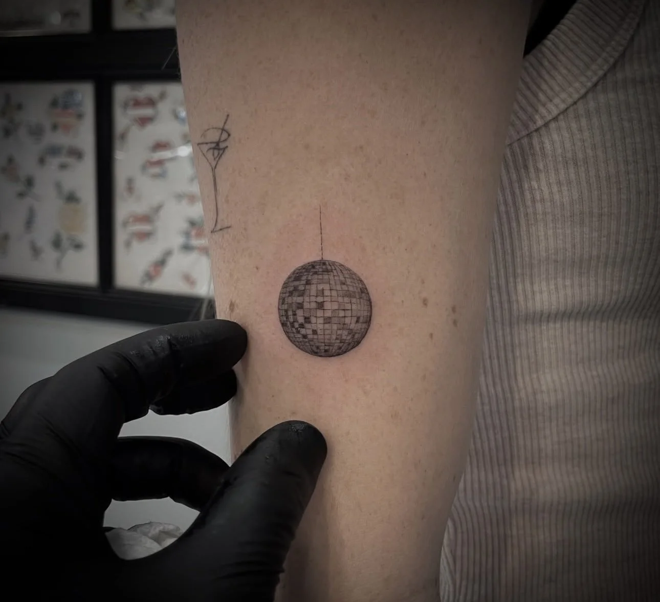 Tiny Disco Ball Tattoo